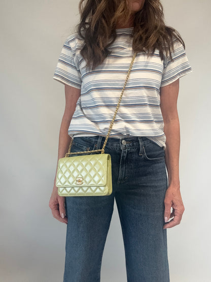 Chanel Quilted Lambskin Wallet On Chain in Pearl Green modeled 2