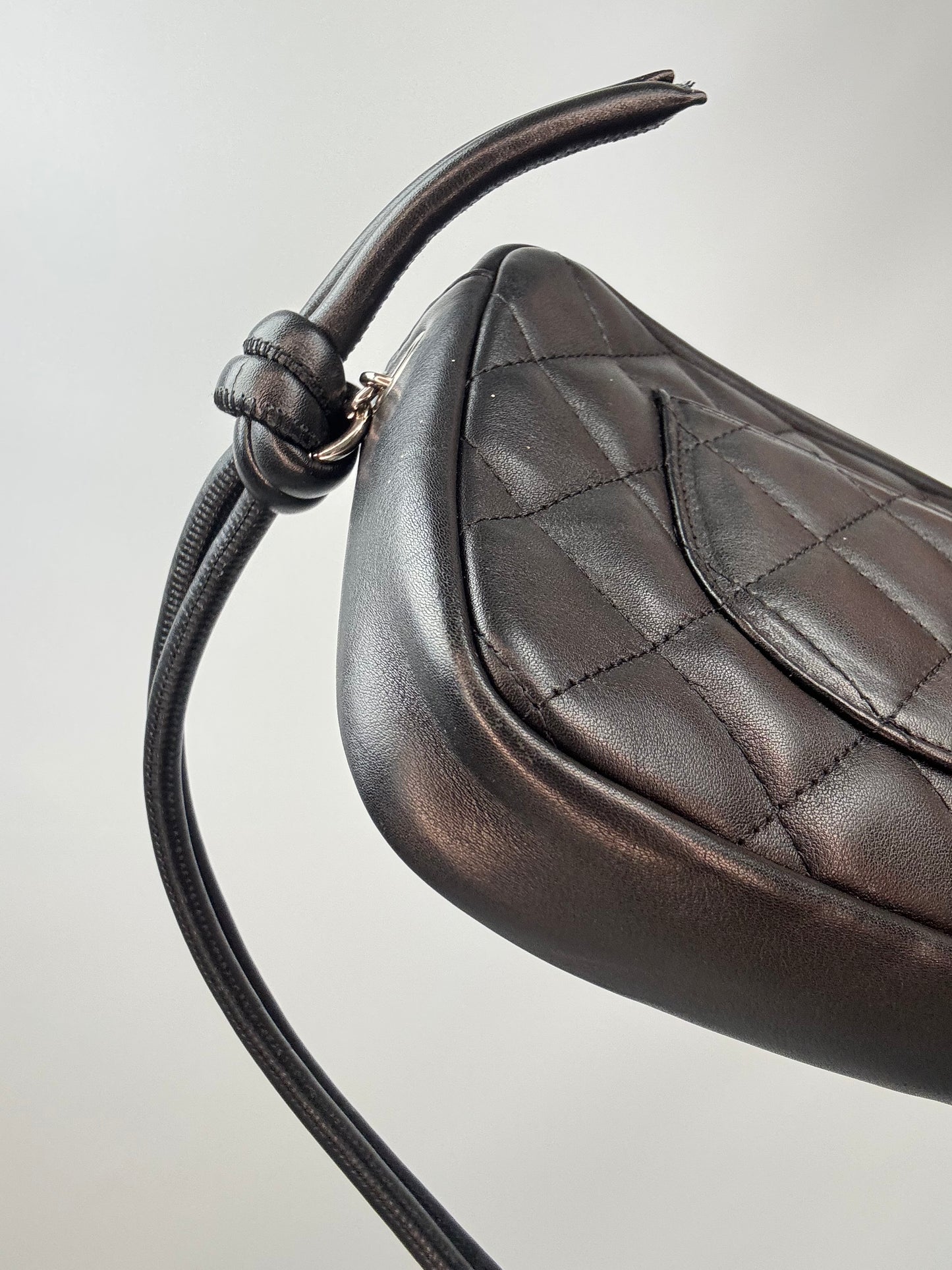 Chanel Quilted Lamsbkin Cambon Pochette back left bottom corner