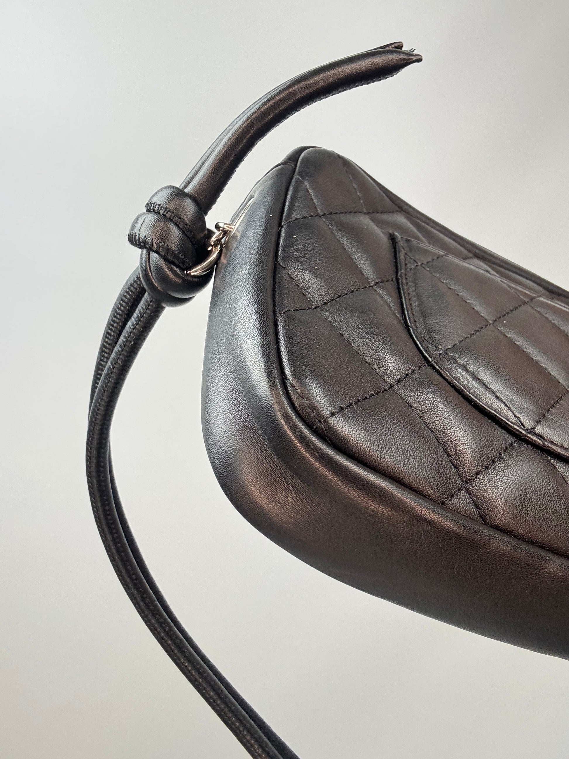 Chanel Quilted Lamsbkin Cambon Pochette back left bottom corner