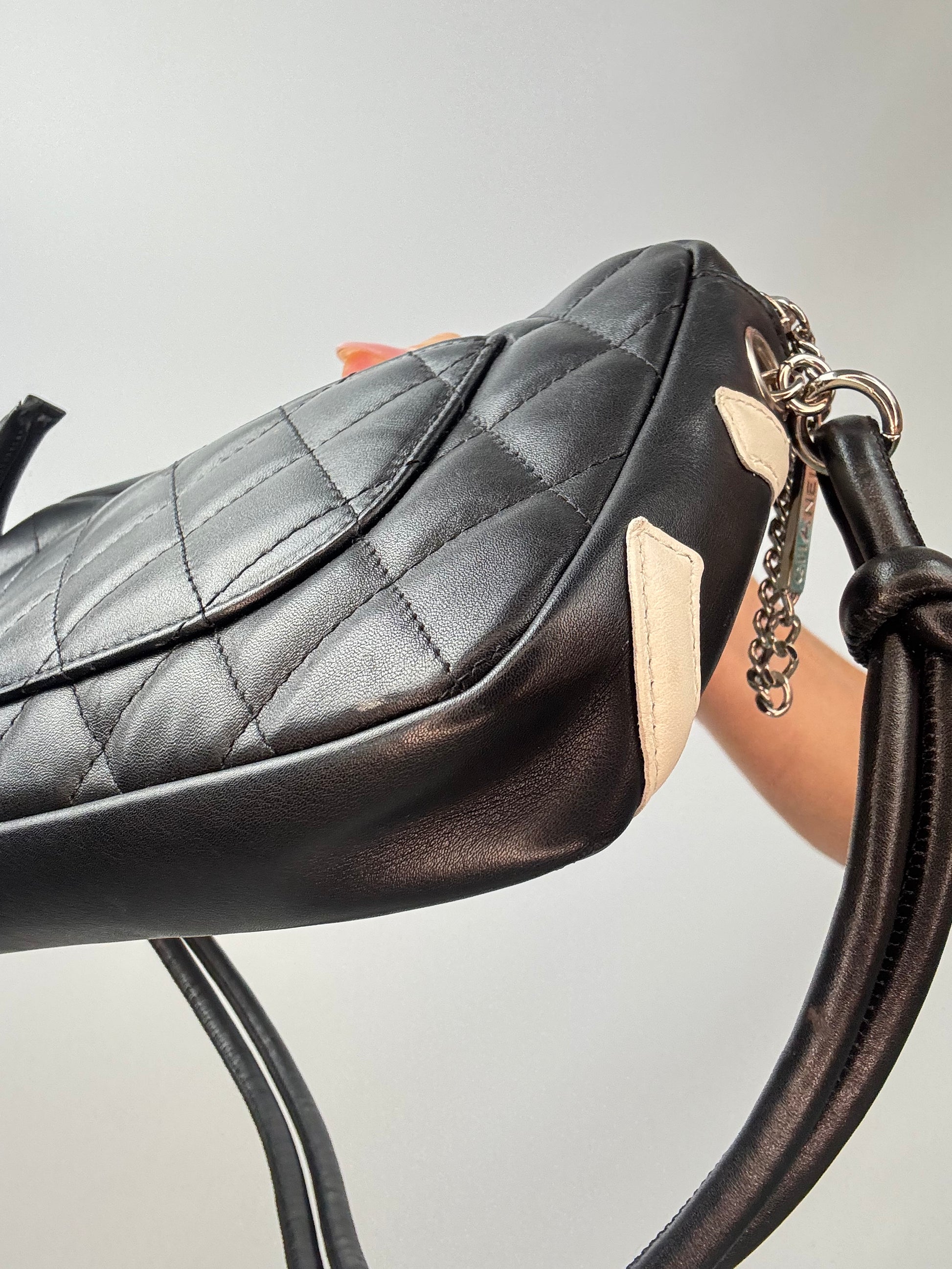Chanel Quilted Lamsbkin Cambon Pochette back right bottom corner