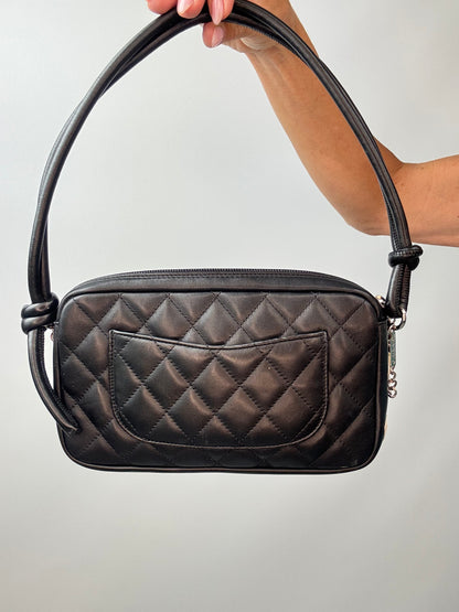 Chanel Quilted Lamsbkin Cambon Pochette back of handbag