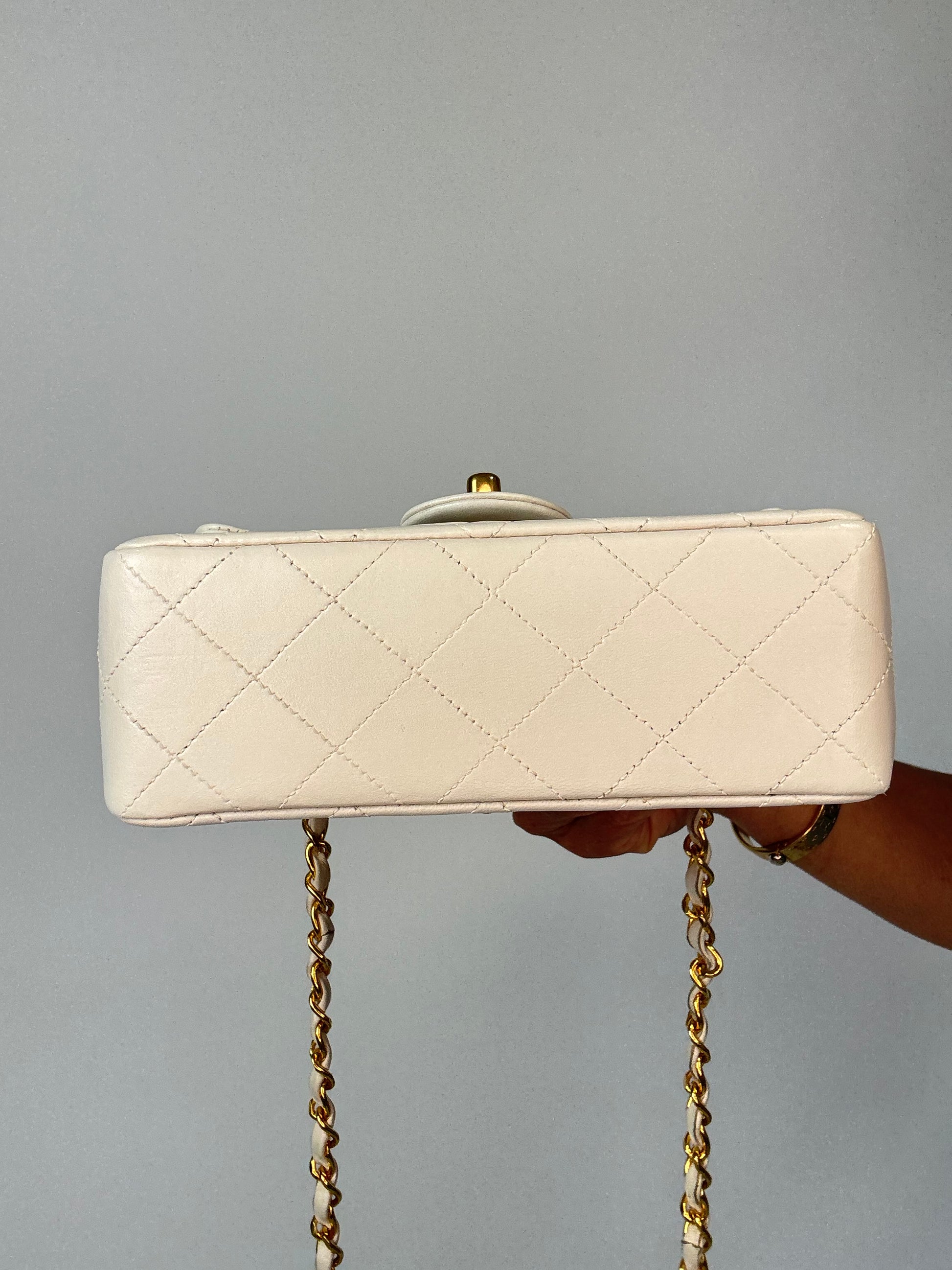 Chanel Quilted White Lambskin Mini Classic Square Flap Bag  bottom of handbag