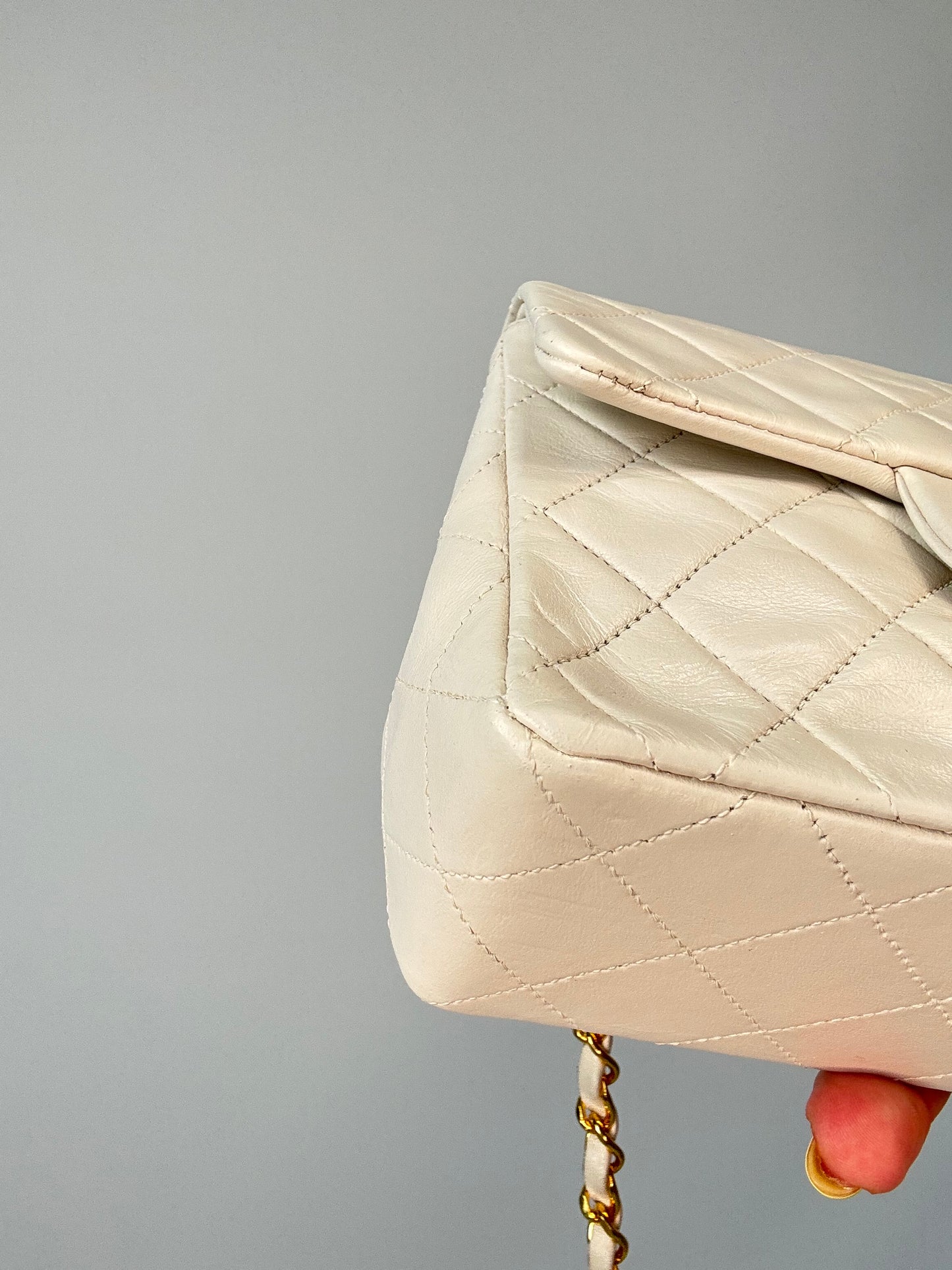 Chanel Quilted White Lambskin Mini Classic Square Flap Bag  front left bottom corner