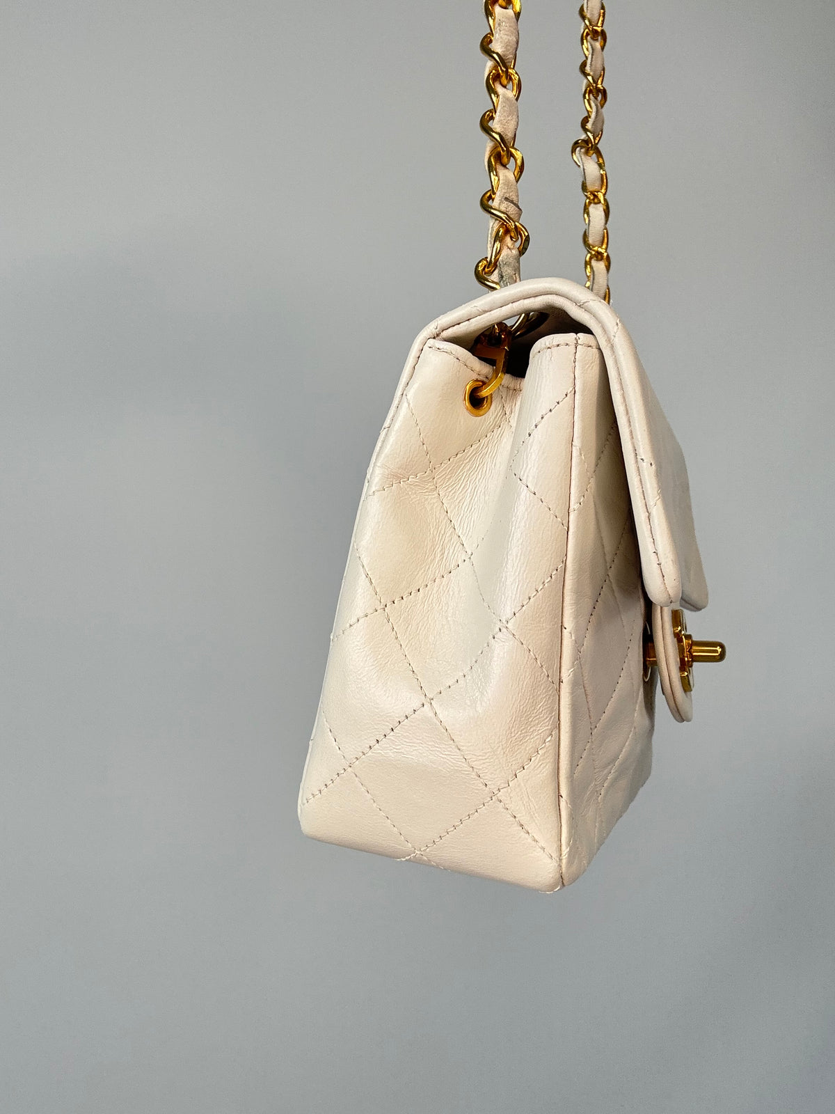 Chanel Quilted White Lambskin Mini Classic Square Flap Bag  left side