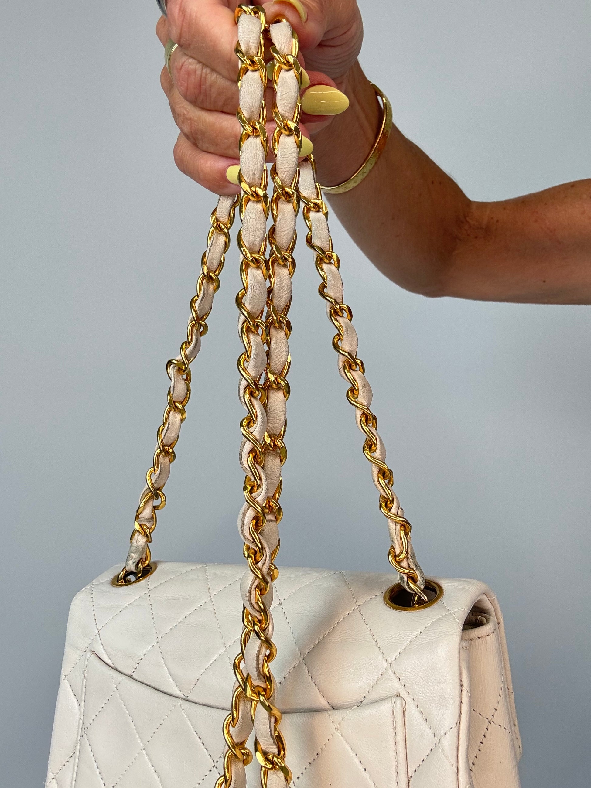 Chanel Quilted White Lambskin Mini Classic Square Flap Bag strap close up