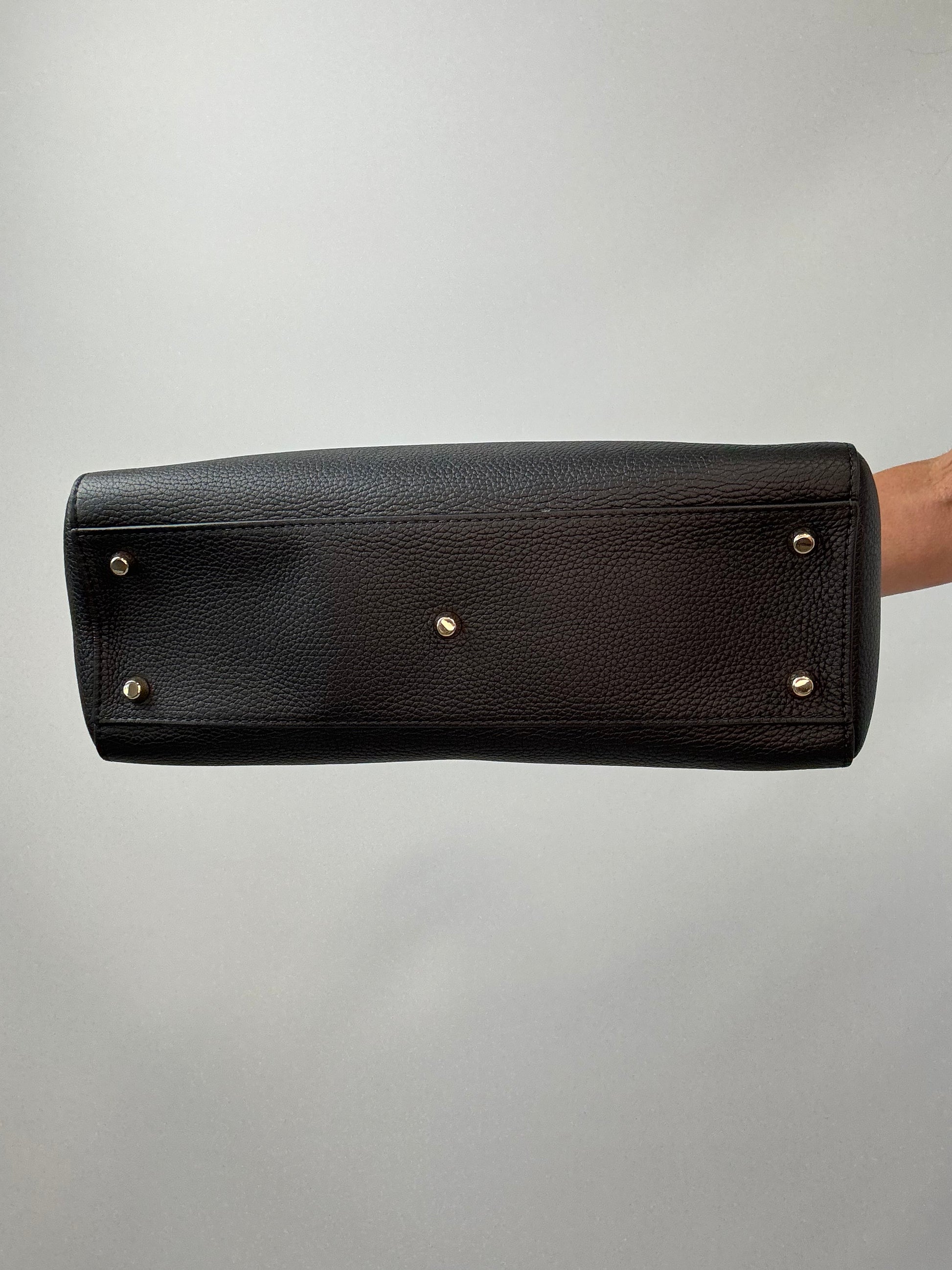 Dior Grained Calfskin Diorissimo Tote - Black bottom of handbag
