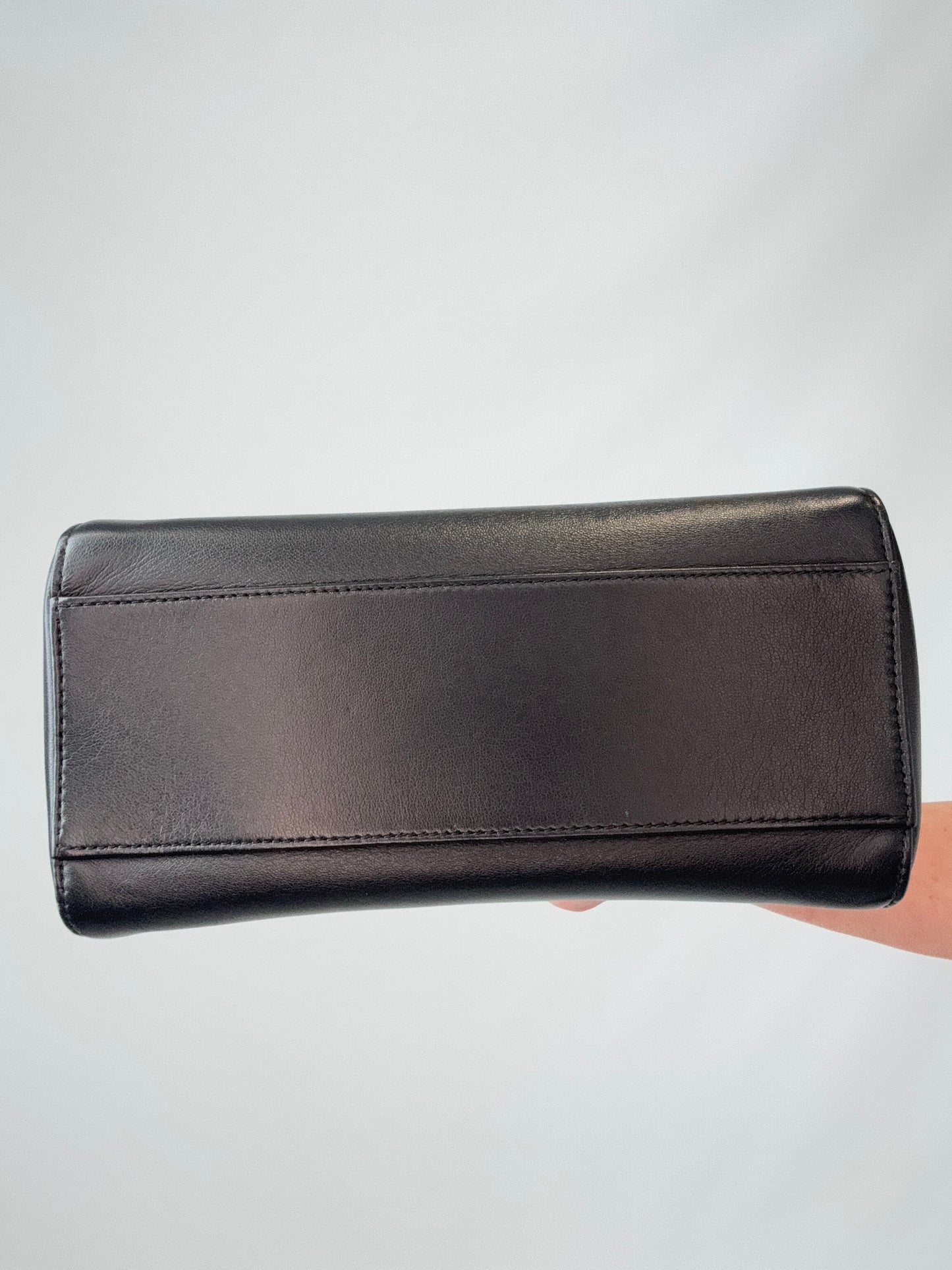 Fendi Monster Eyes Mini Peekaboo Satchel in Black bottom of handbag