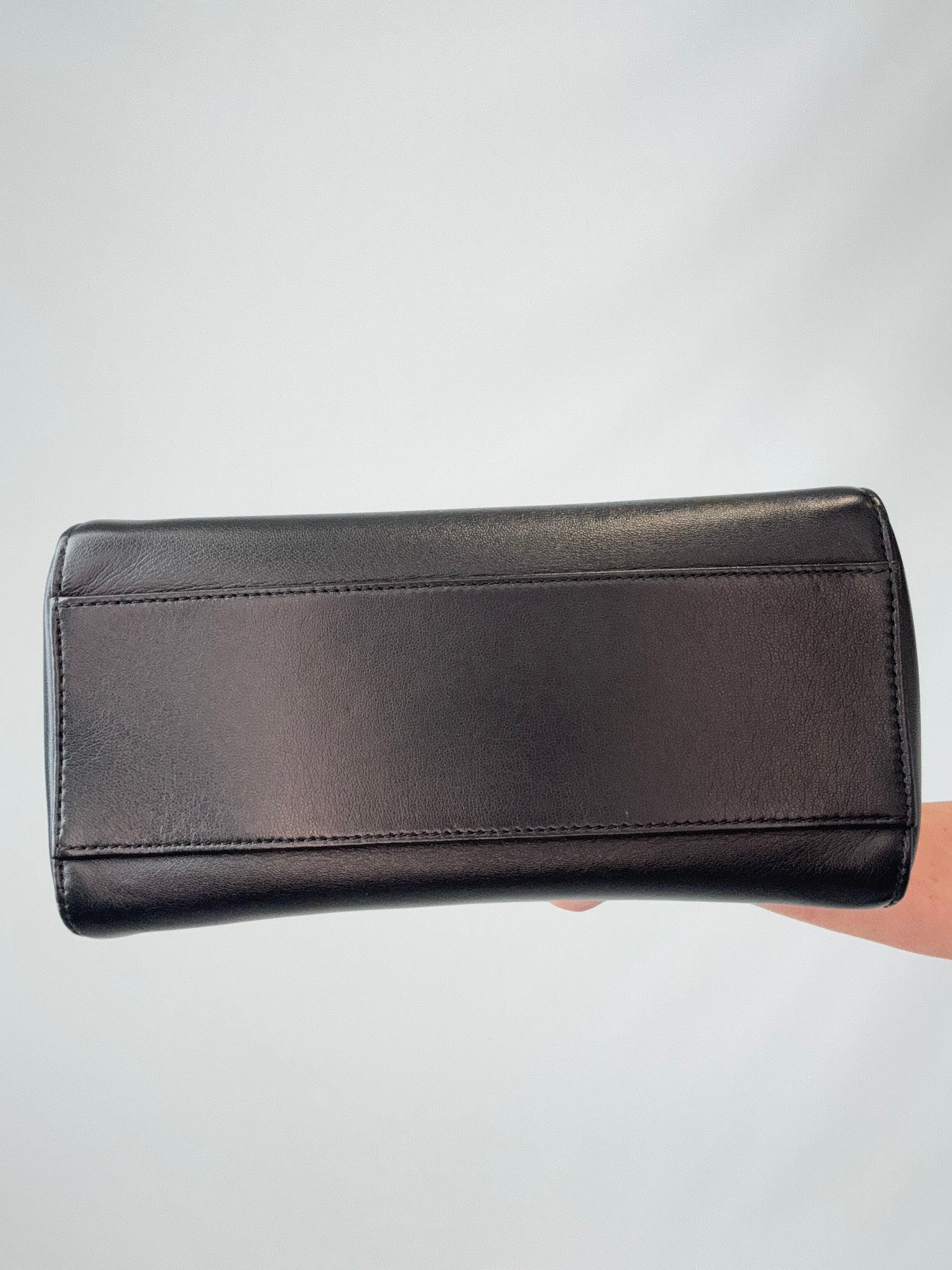 Fendi Monster Eyes Mini Peekaboo Satchel in Black bottom of handbag