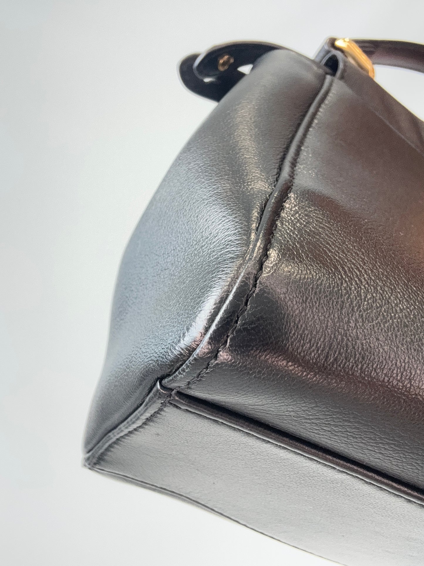 Fendi Monster Eyes Mini Peekaboo Satchel in Black front left bottom corner