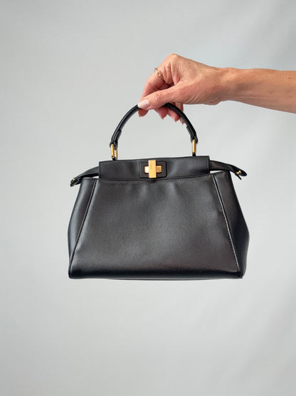 Fendi Monster Eyes Mini Peekaboo Satchel in Black front of handbag