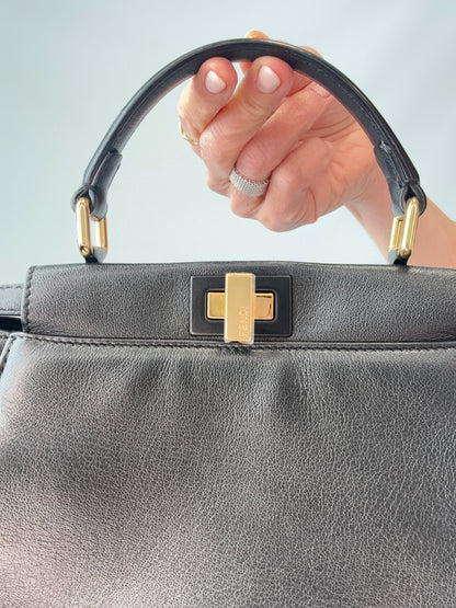 Fendi Monster Eyes Mini Peekaboo Satchel in Black turn lock