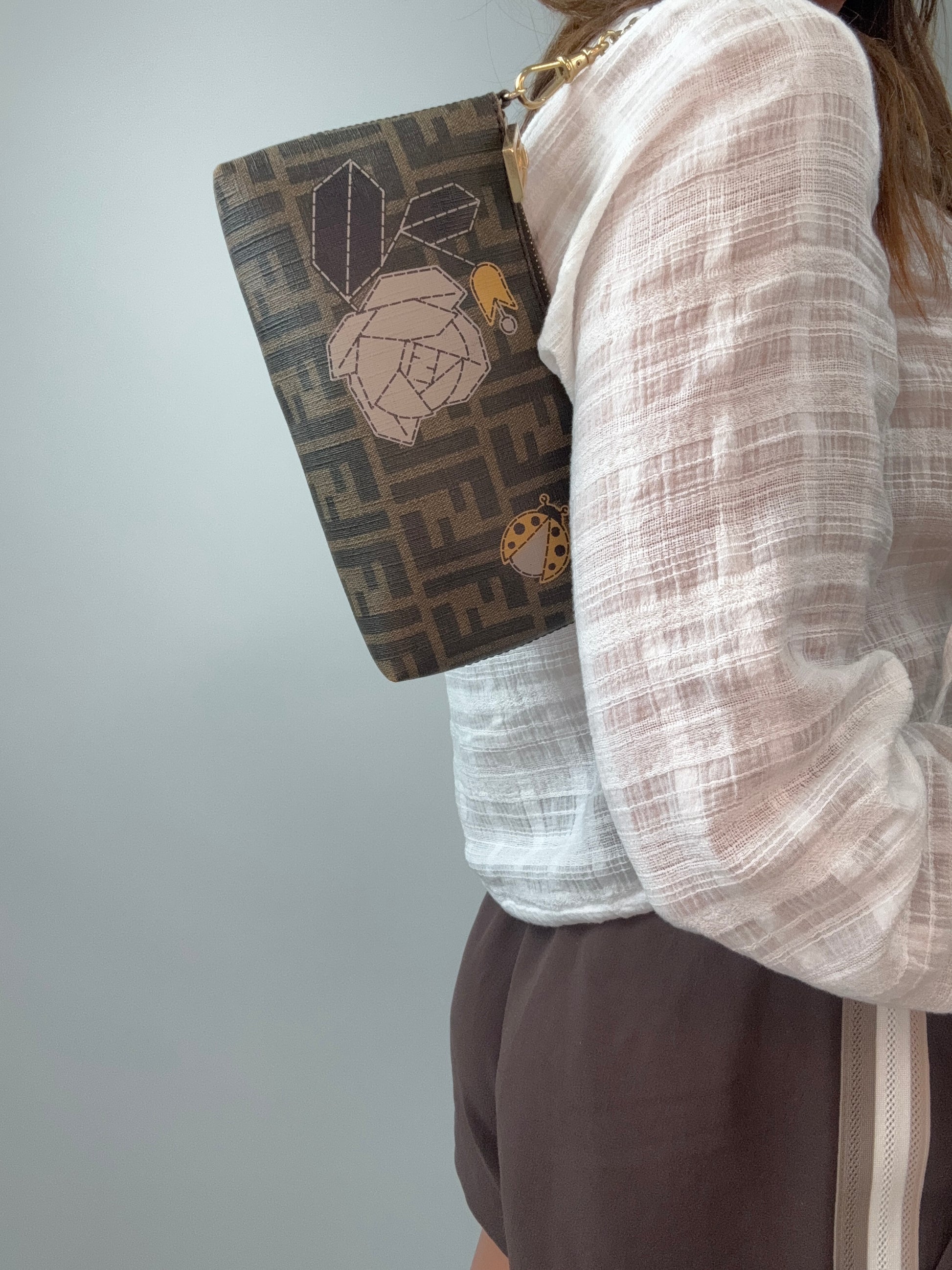 Fendi Zucca Spalmati Rose Ladybug Pochette Tabacco modeled