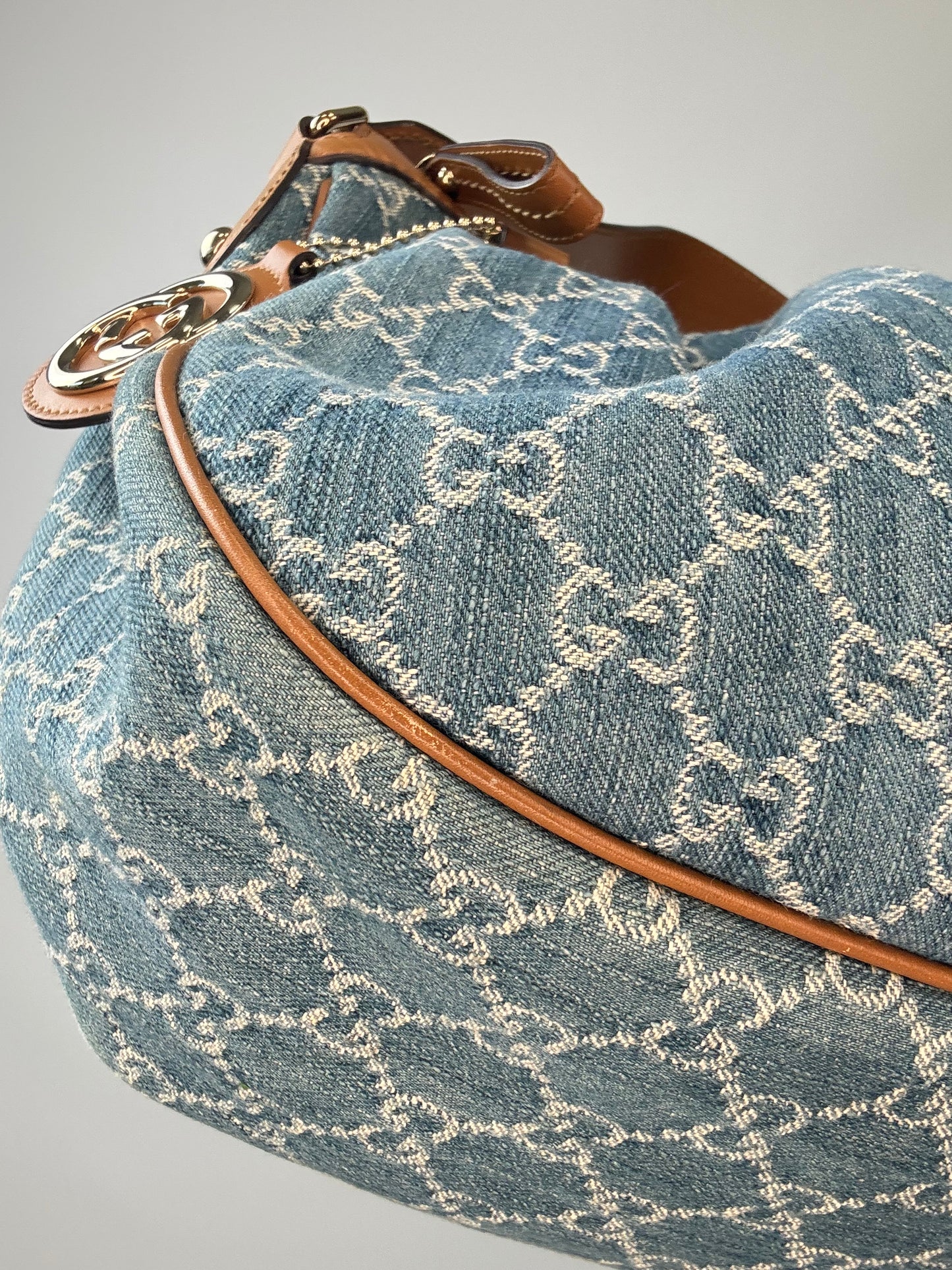 Gucci Blue GG Denim Medium Sukey Tote Bag front left bottom corner