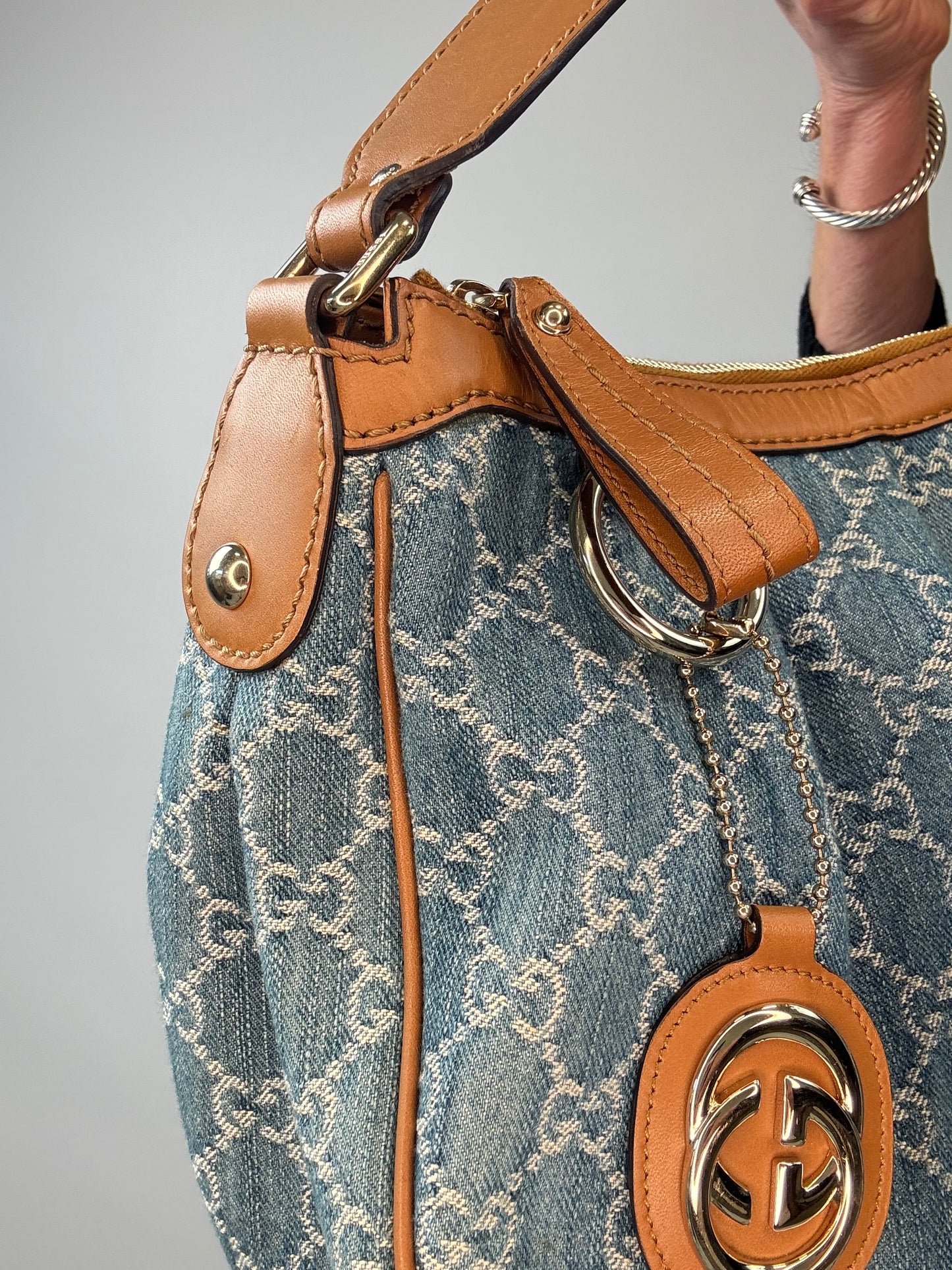 Gucci Blue GG Denim Medium Sukey Tote Bag leather zipper pull and hardware