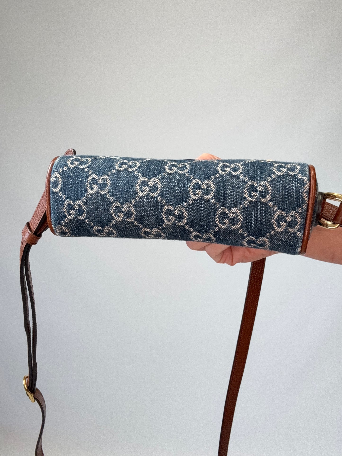 Gucci Denim Monogram Mini Crossbody bottom of handbag