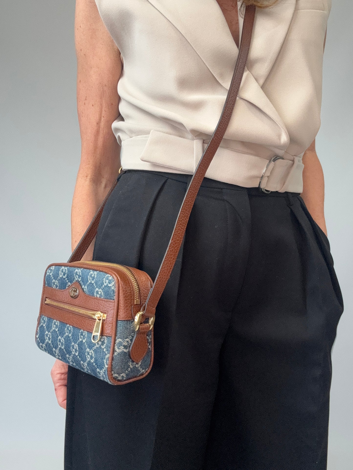 Gucci Denim Monogram Mini Crossbody modeled 2