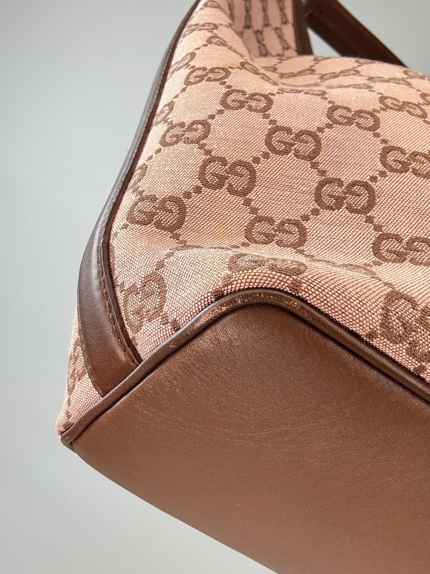 Gucci GG Canvas Hobo Bag front left bottom corner