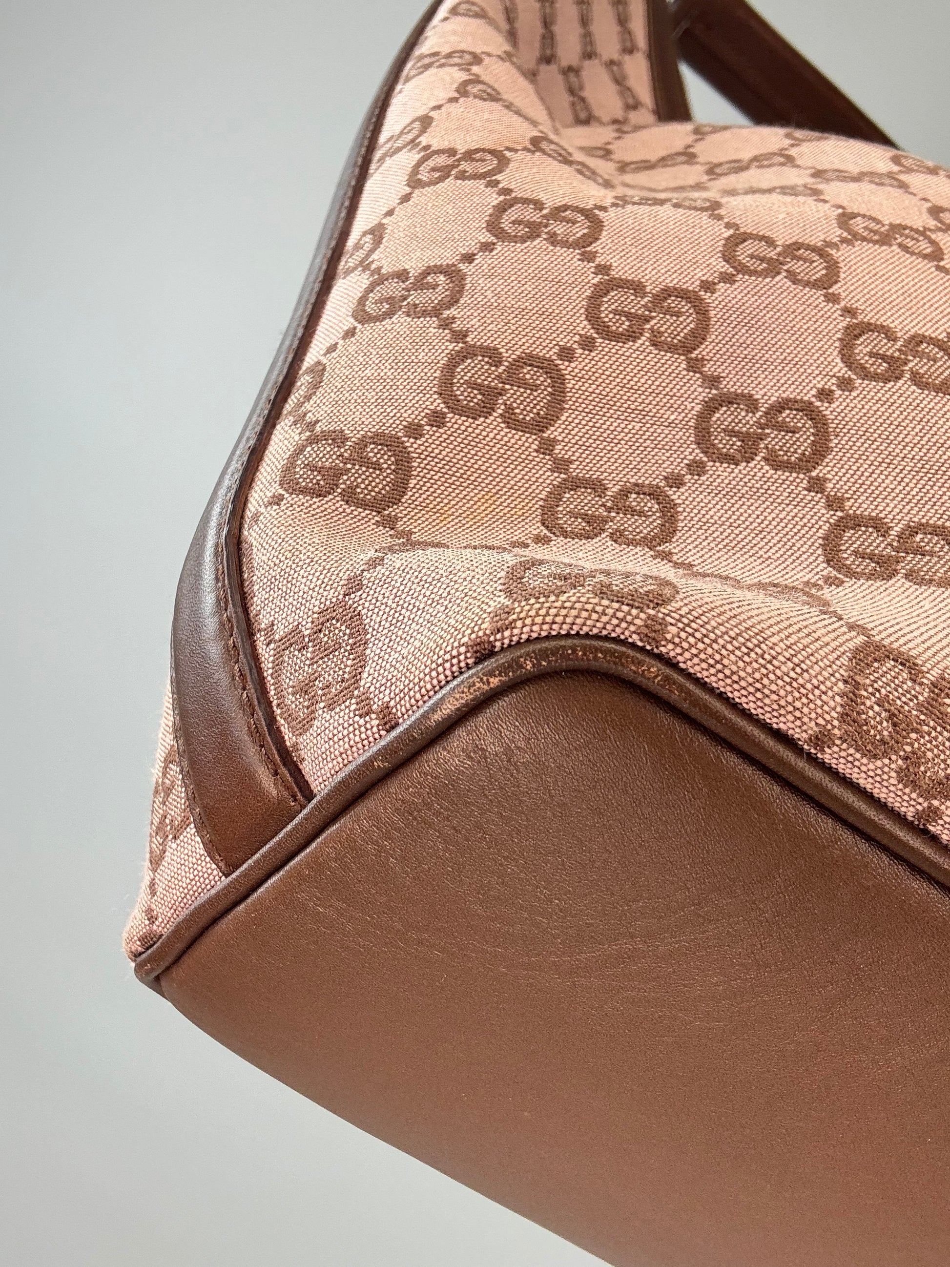 Gucci GG Canvas Hobo Bag front left bottom corner