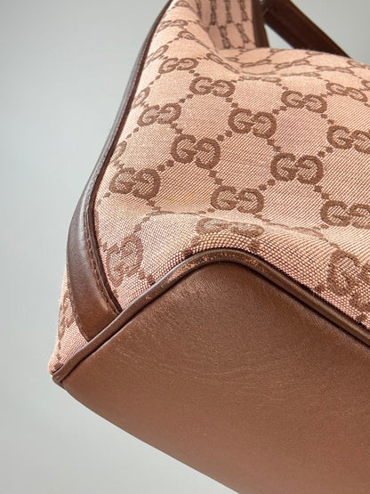 Gucci GG Canvas Hobo Bag front left bottom corner