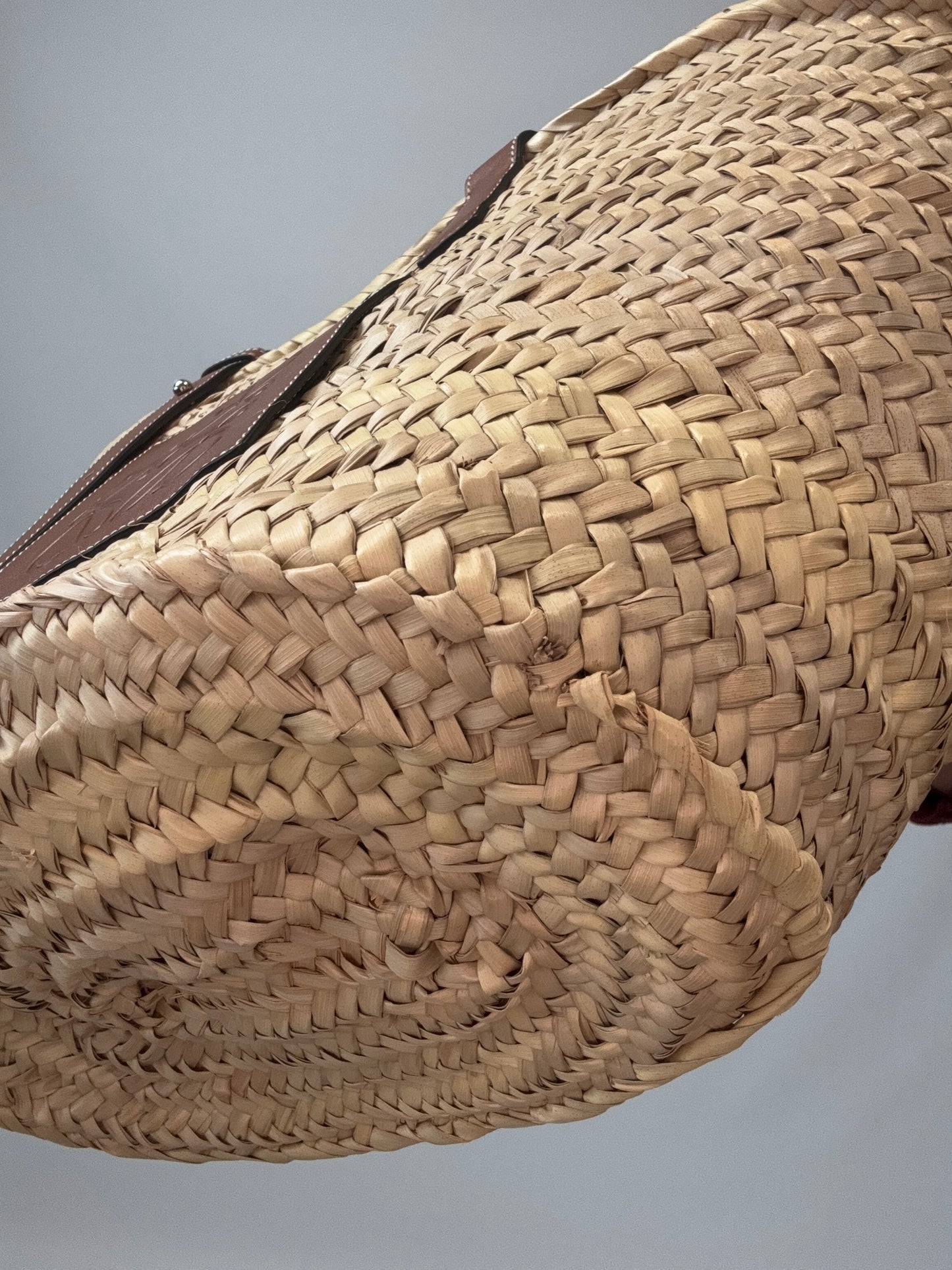 Loewe Basket In Palm Leaf and Leather Skin Tote Bag front right bottom corner
