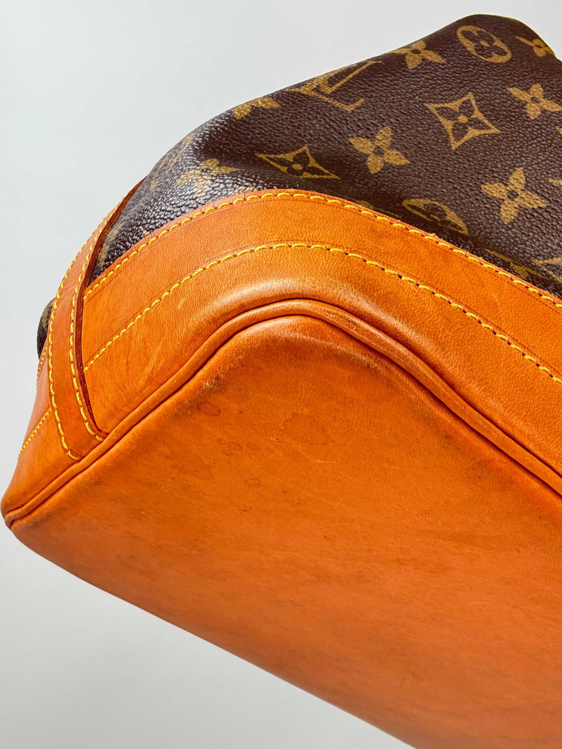 Louis Vuitton Monogram Canvas Noé Bucket Bag front left bottom corner