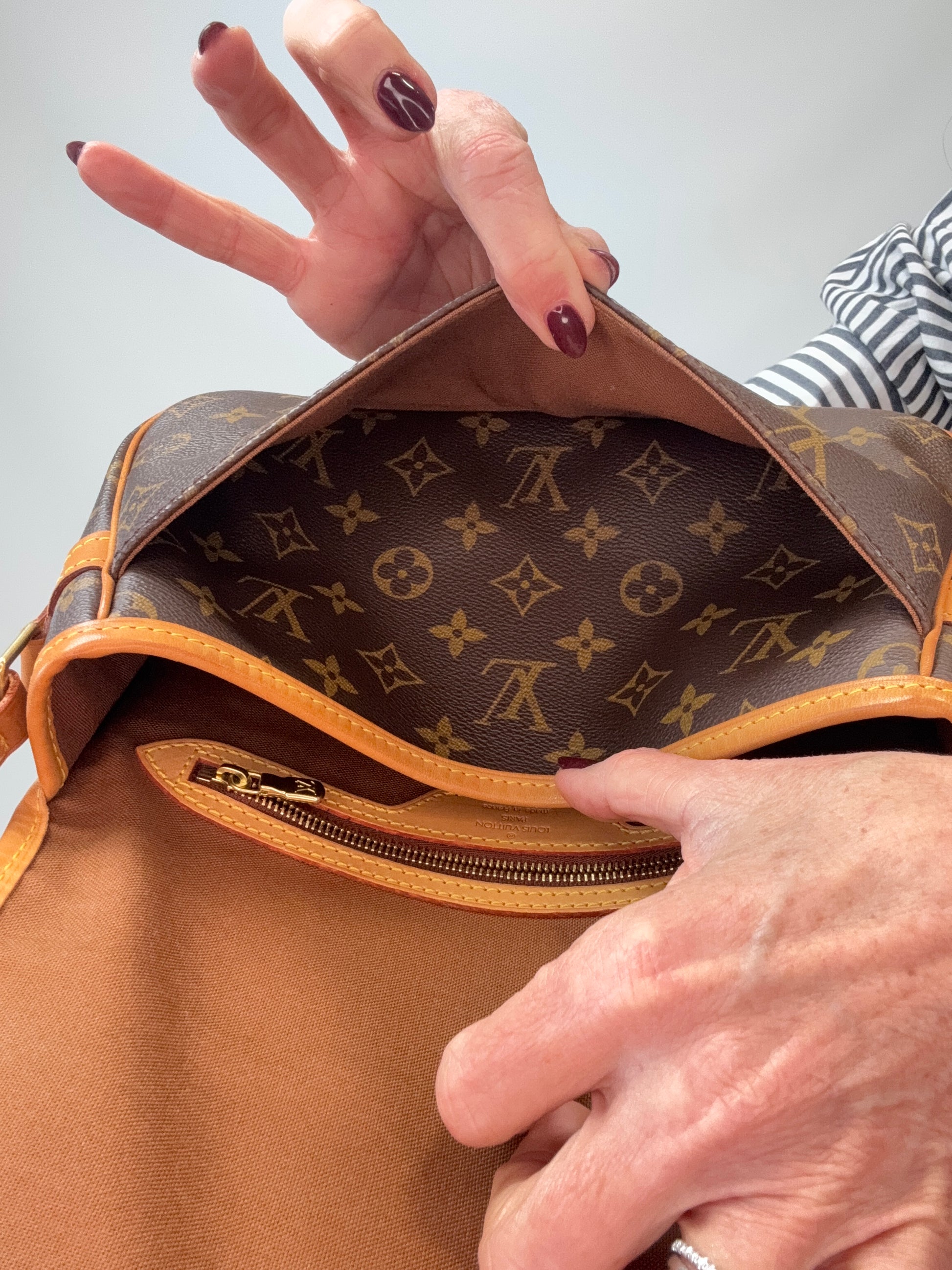 LOUIS VUITTON Monogram Canvas Sologne interior of exterior front pocket