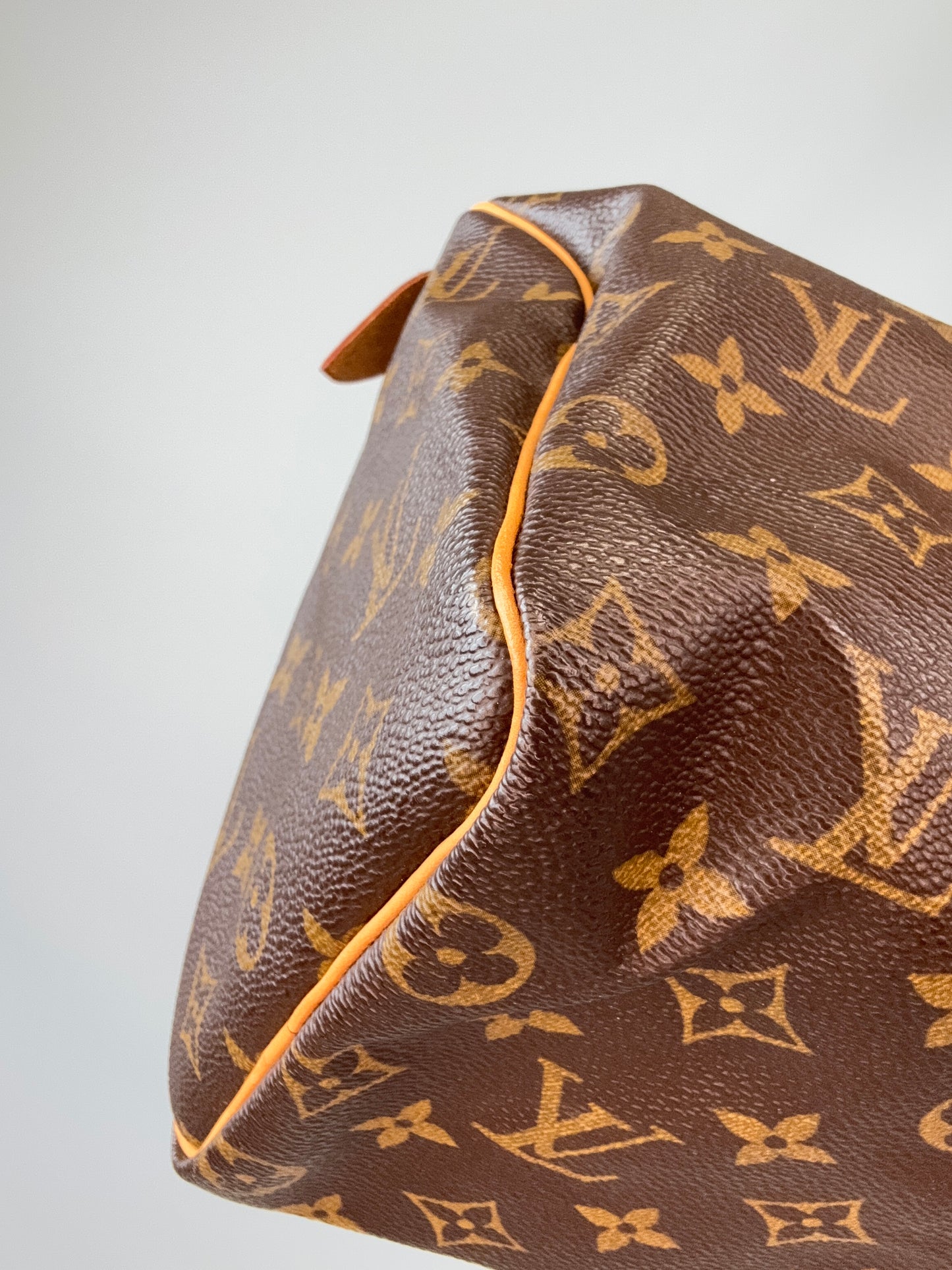 Louis Vuitton Monogram Canvas Speedy 25 – 2002 front left bottom corner