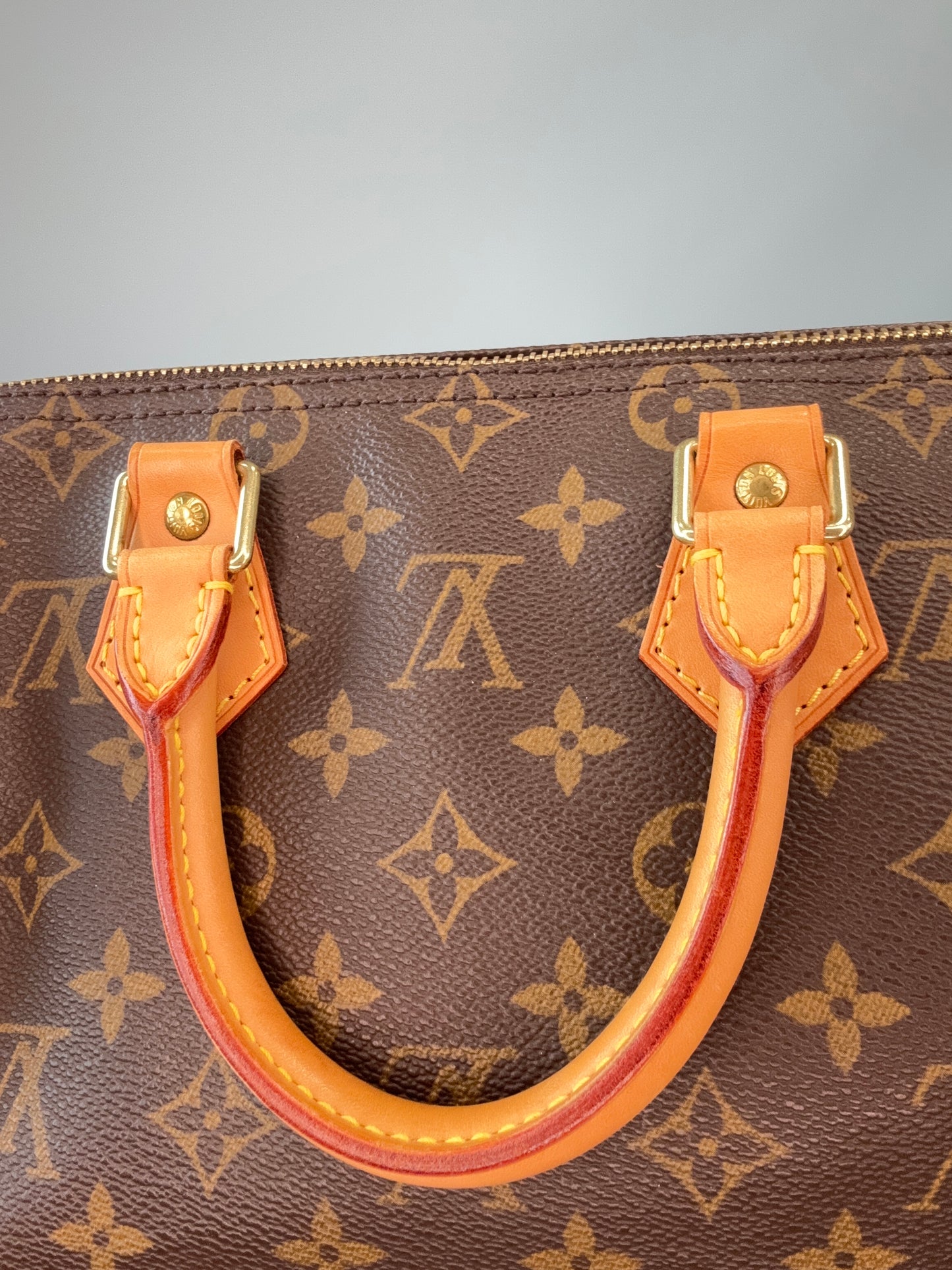 Louis Vuitton Monogram Canvas Speedy 25 – 2002 interior of back top handle