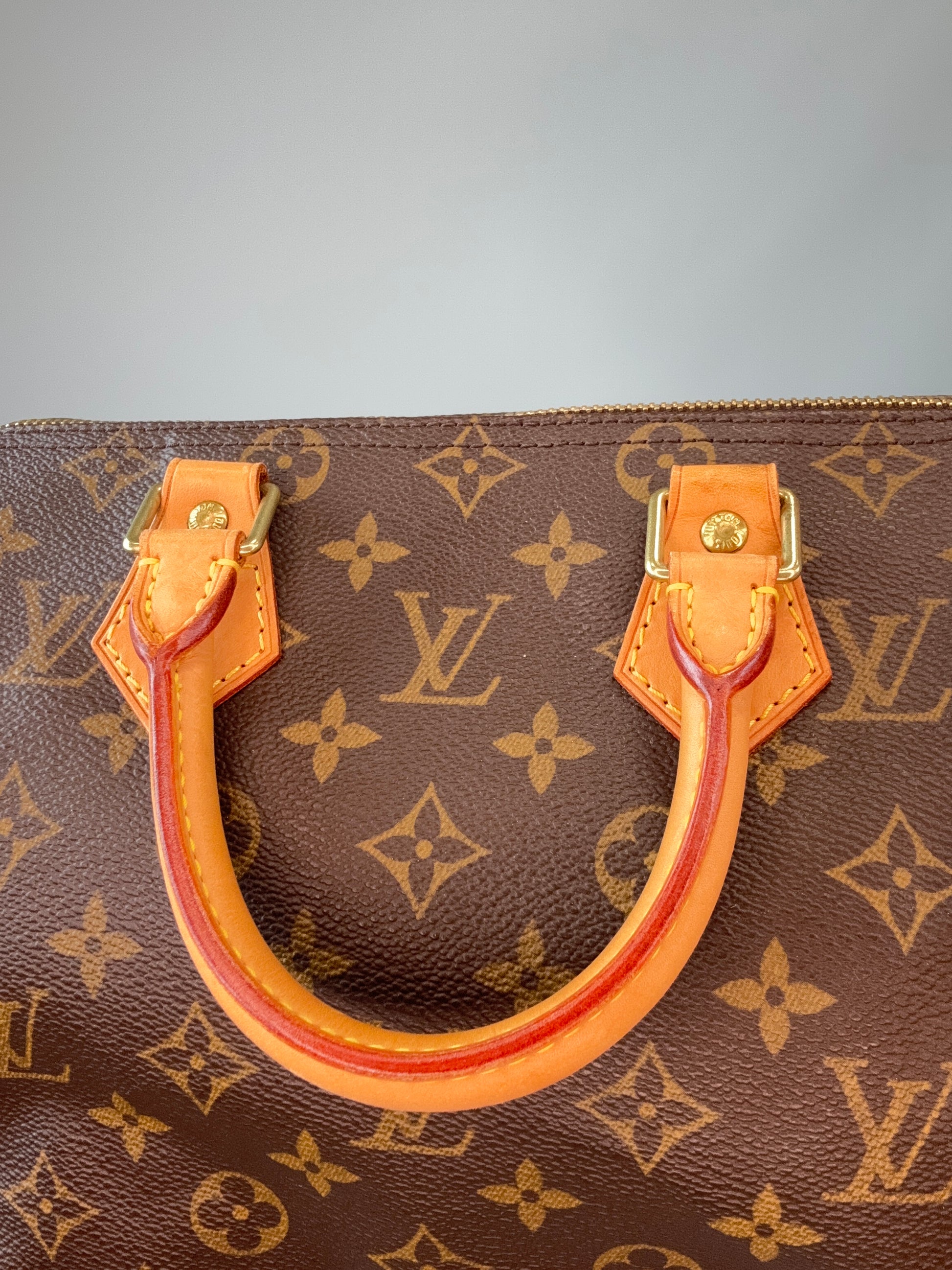 Louis Vuitton Monogram Canvas Speedy 25 – 2002 interior of front top handle