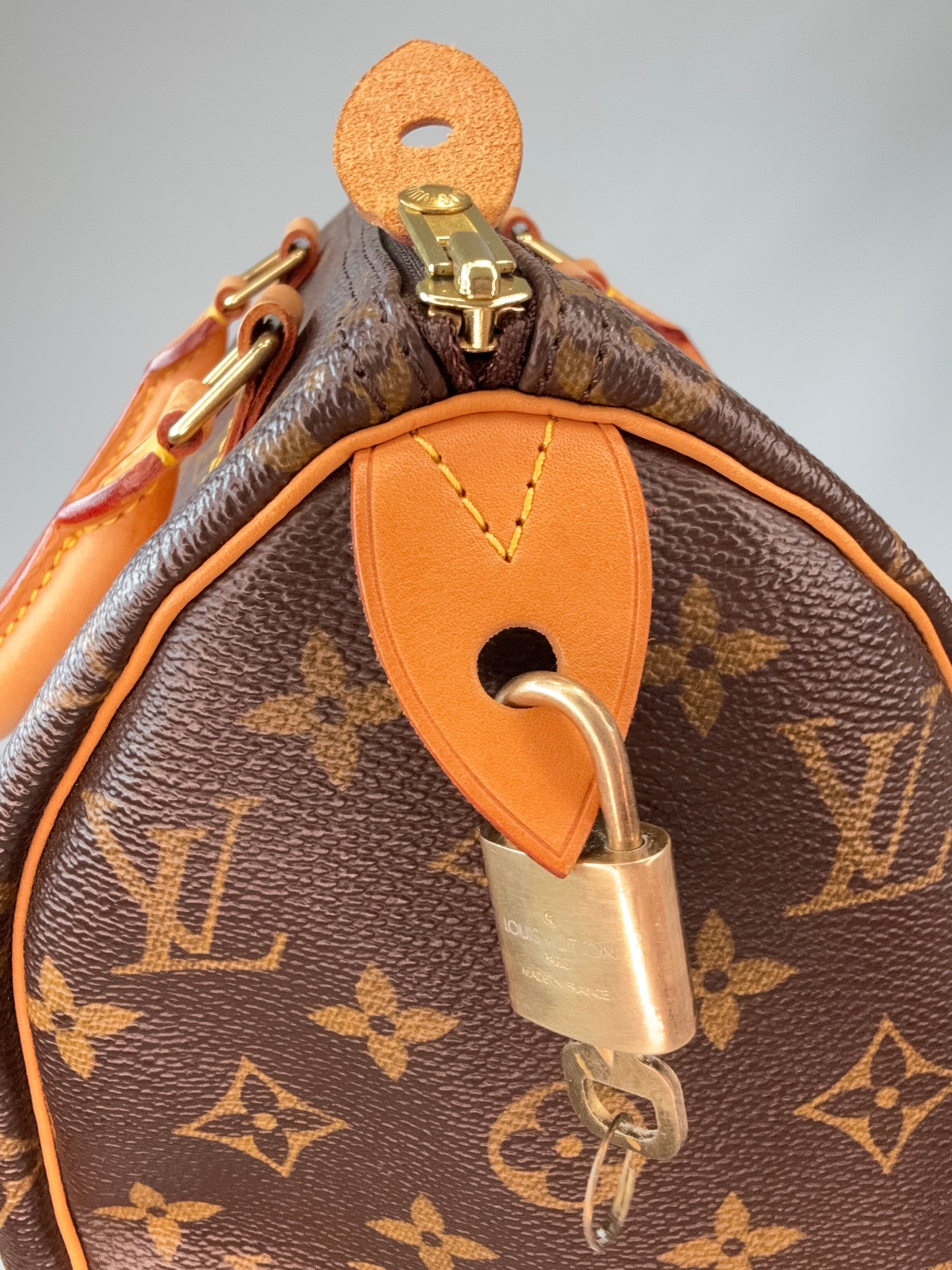 Louis Vuitton Monogram Canvas Speedy 25 – 2002 leather tab with lock