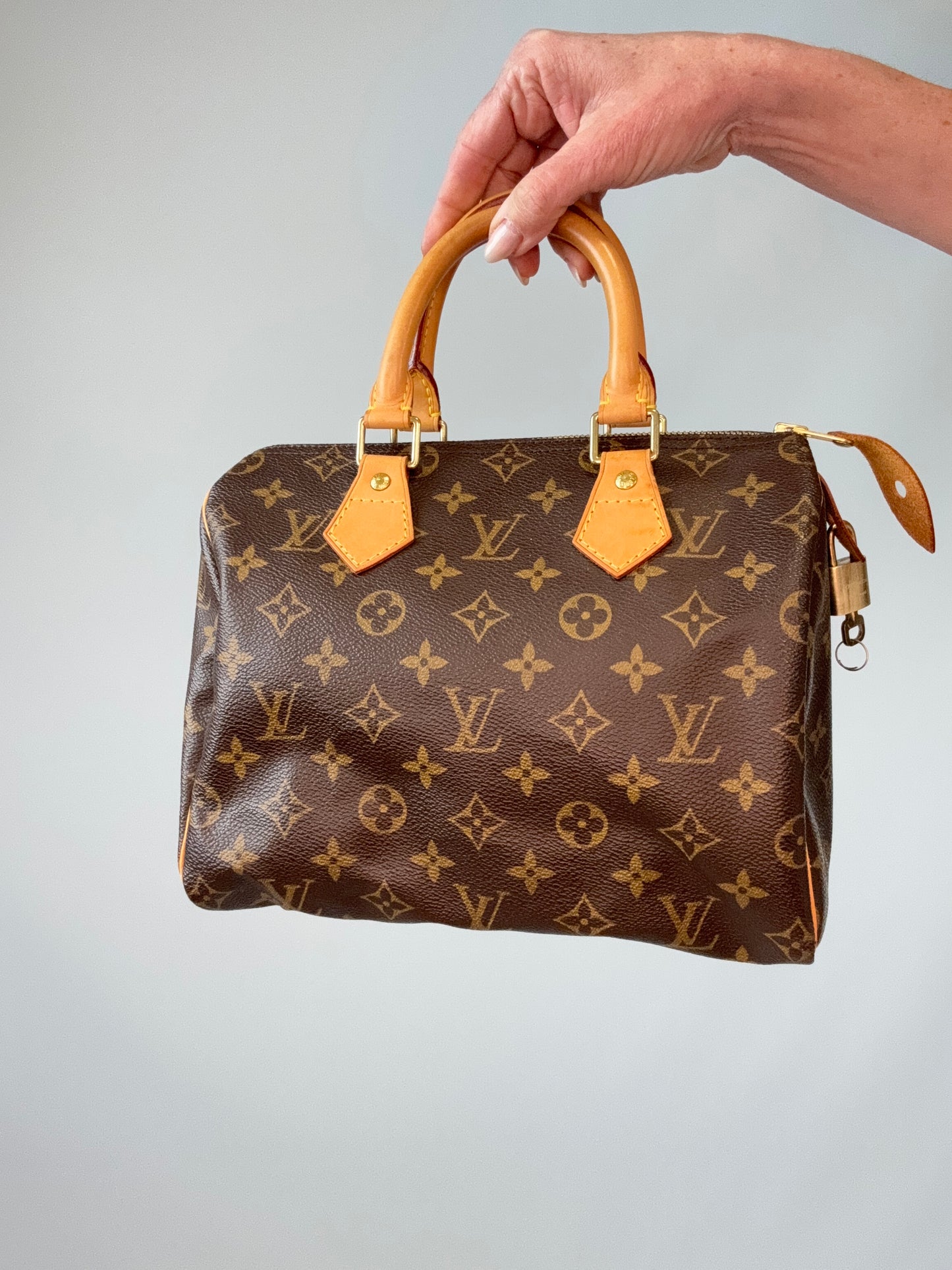 Louis Vuitton Monogram Canvas Speedy 25 – 2002 front of handbag