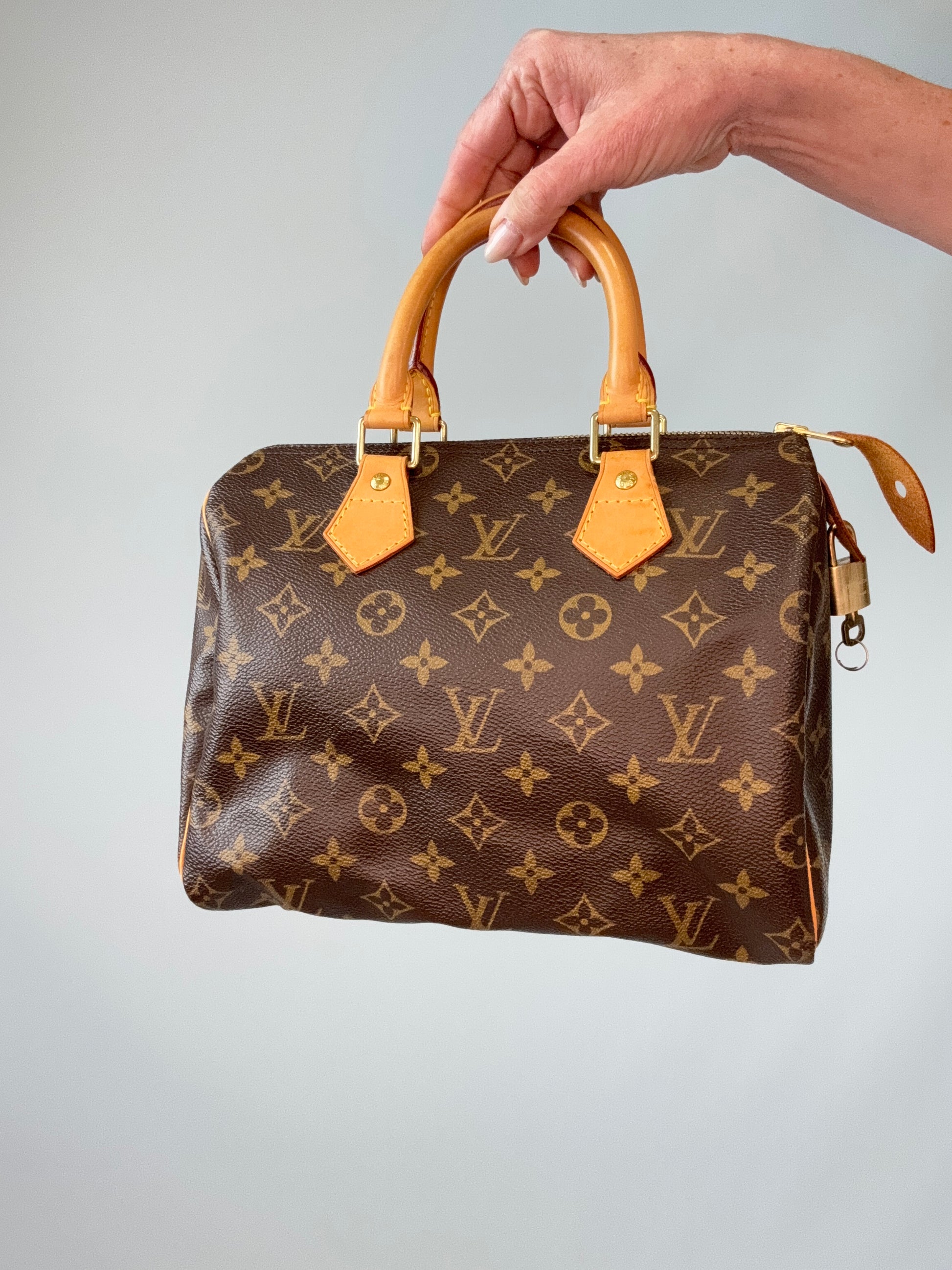 Louis Vuitton Monogram Canvas Speedy 25 – 2002 front of handbag