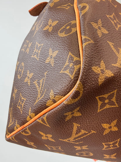 Louis Vuitton Monogram Canvas Speedy 30 - 1990 front left bottom corner