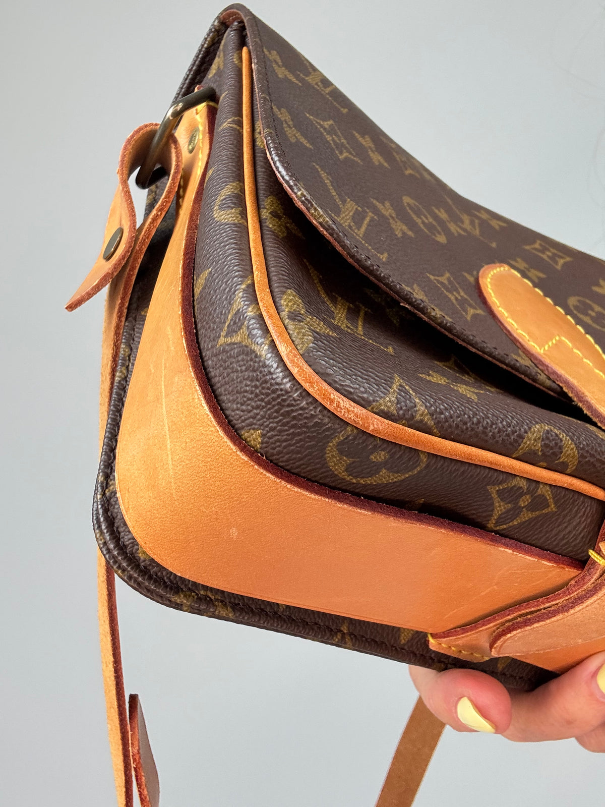 Louis Vuitton Monogram Canvas Cartouchière MM front left bottom corner