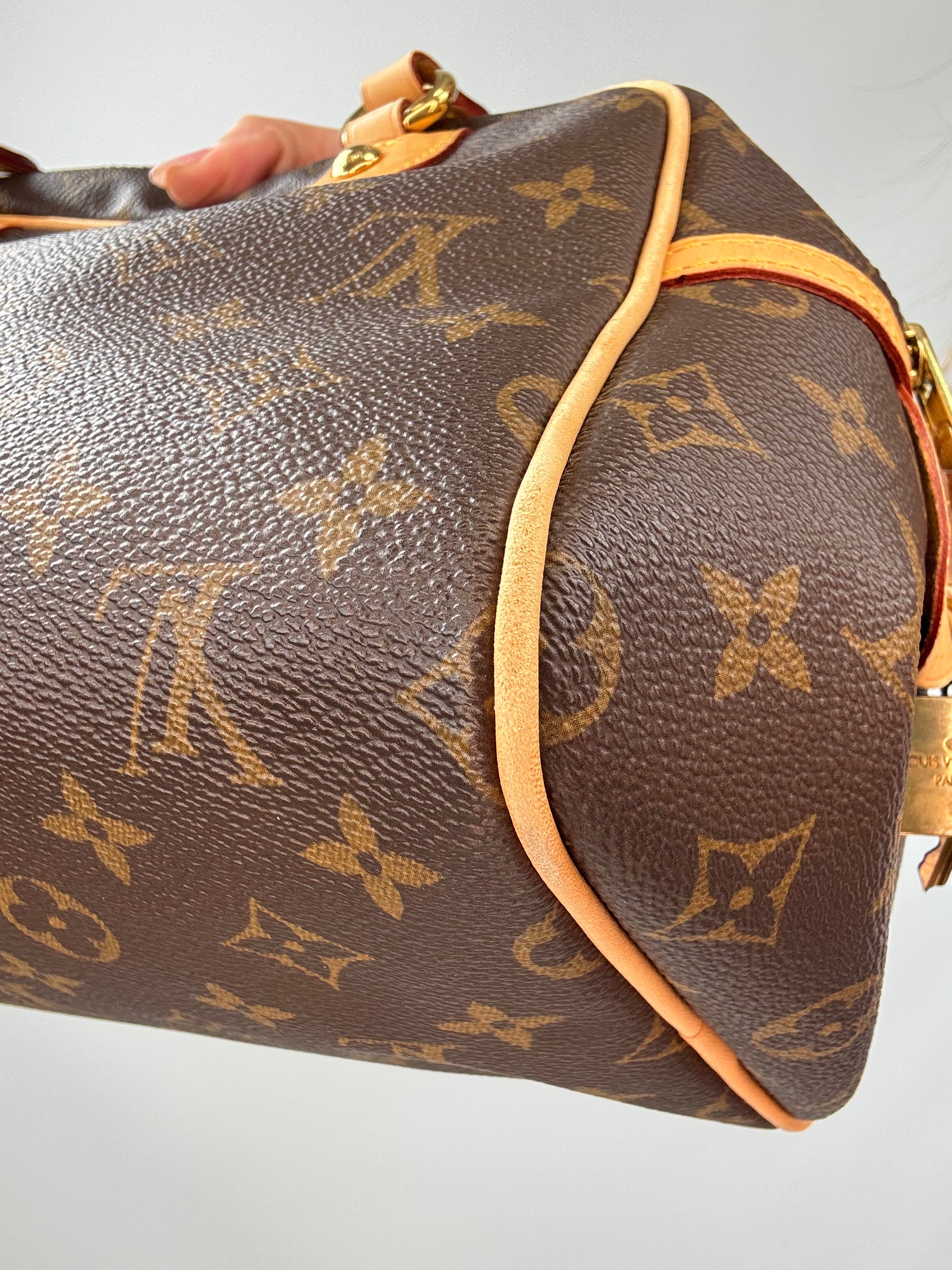 Louis Vuitton Monogram Montorgueil PM back right bottom corner