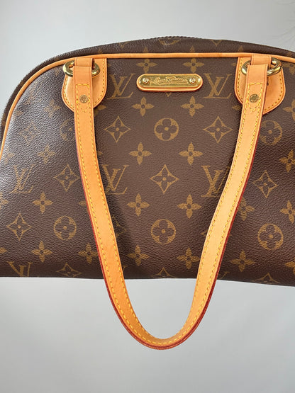 Louis Vuitton Monogram Montorgueil PM interior of front strap
