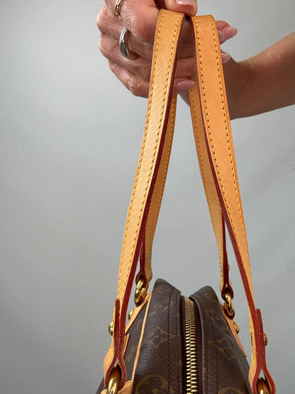 Louis Vuitton Monogram Montorgueil PM right side of both straps