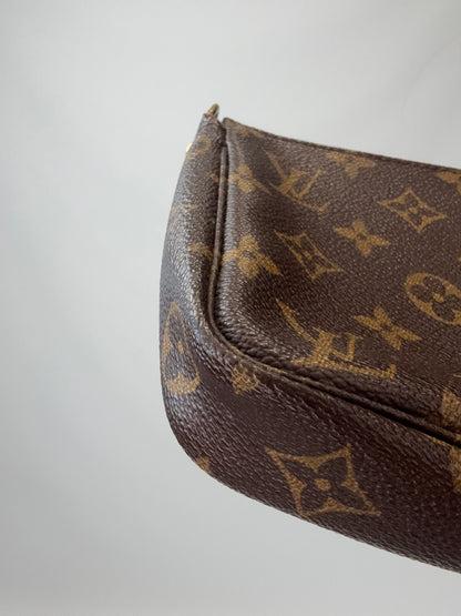 Louis Vuitton Monogram Pochette back left bottom corner