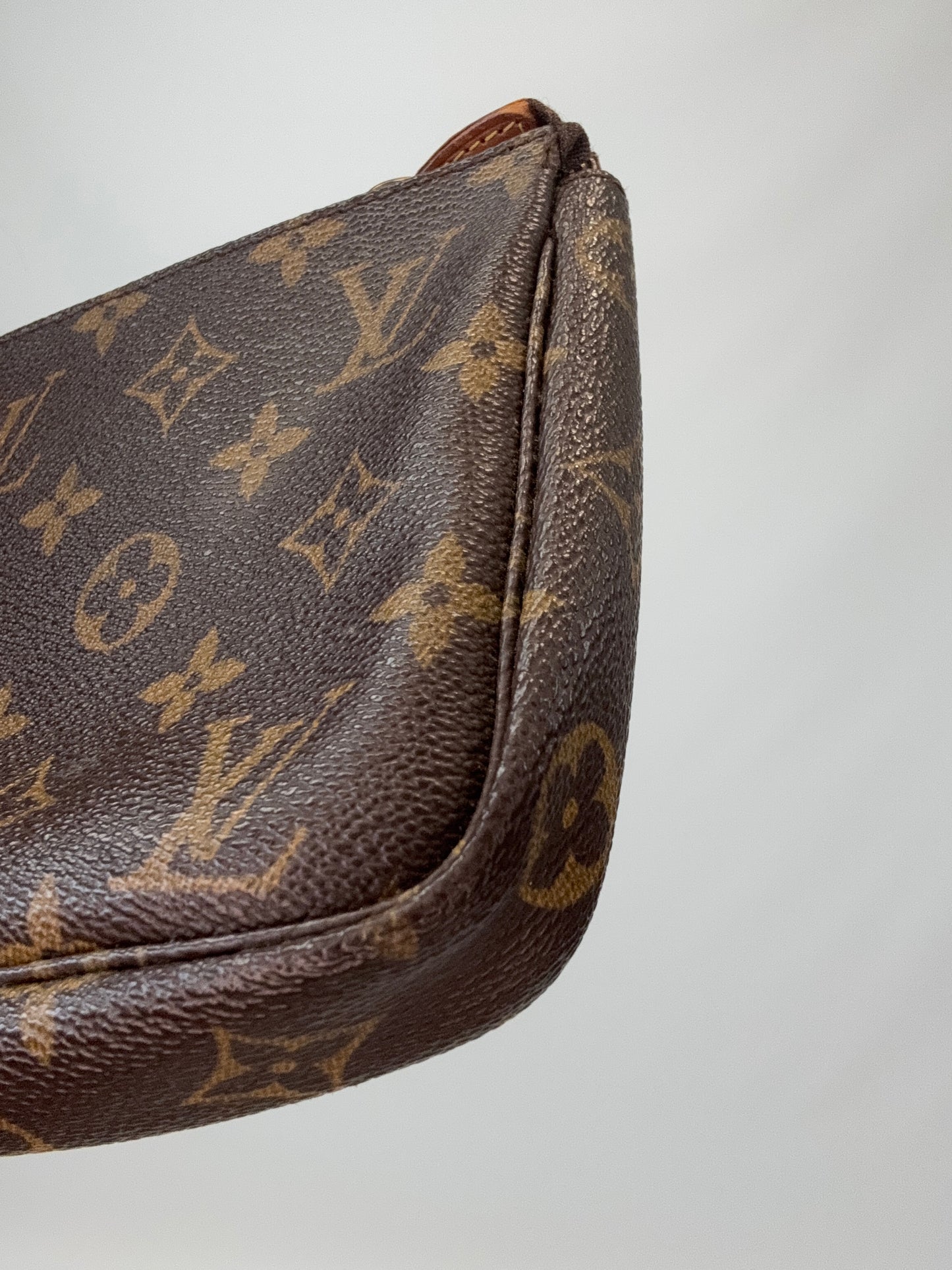 Louis Vuitton Monogram Pochette back right bottom corner