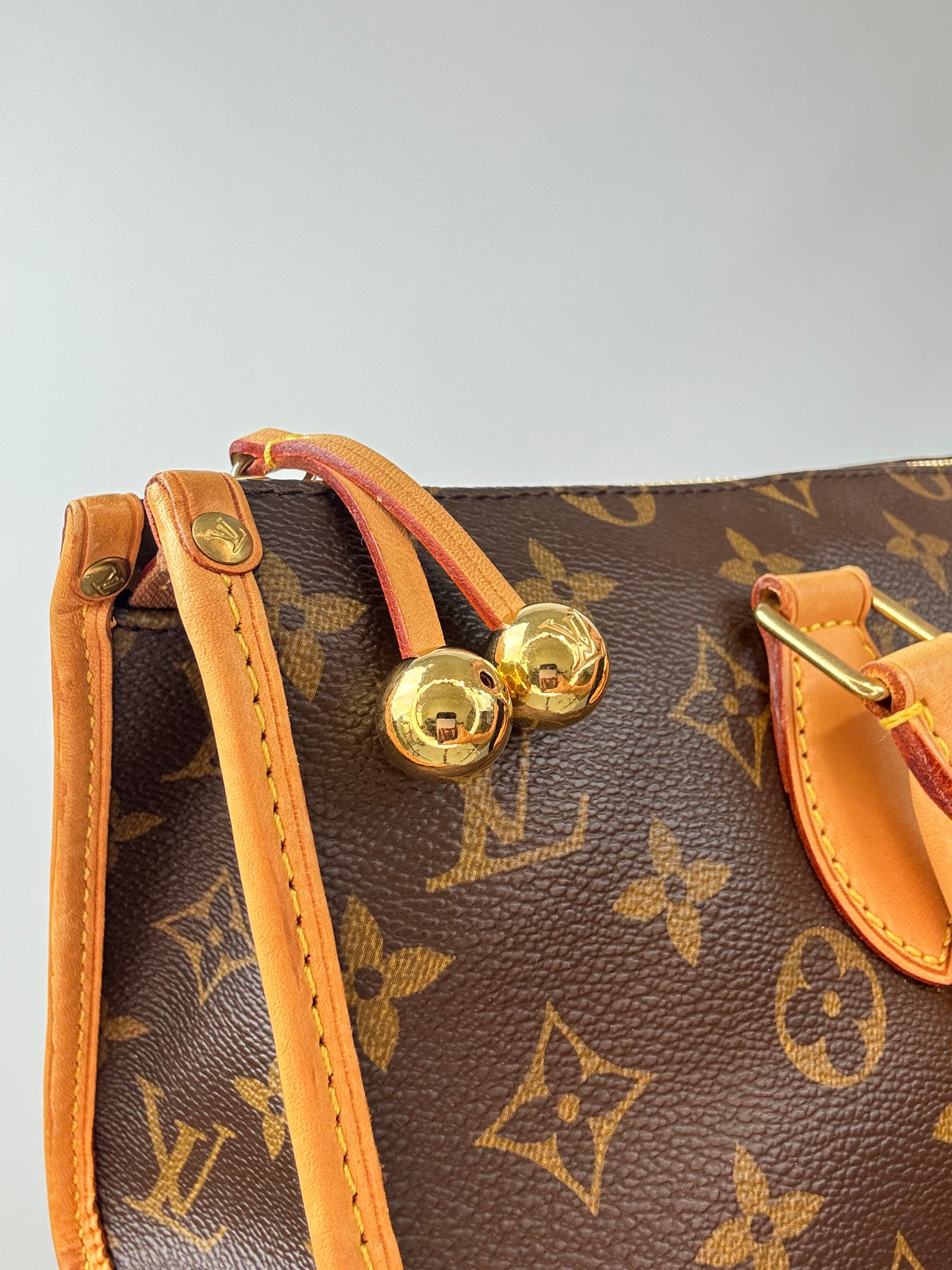 Louis Vuitton Monogram Popincourt front upper left corner