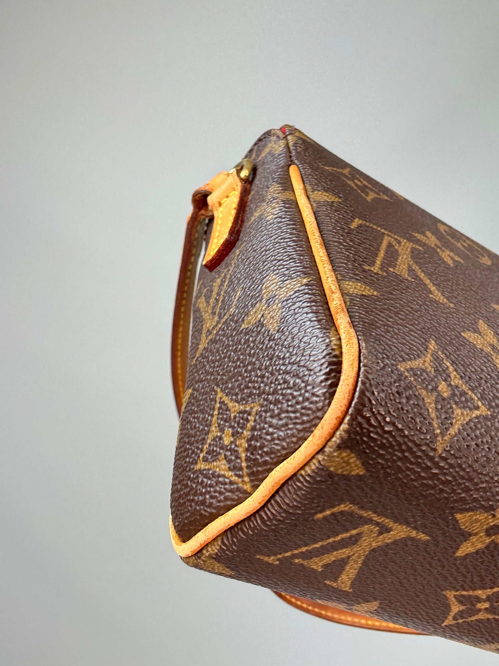 Louis Vuitton Monogram Recital Bag back left bottom corner