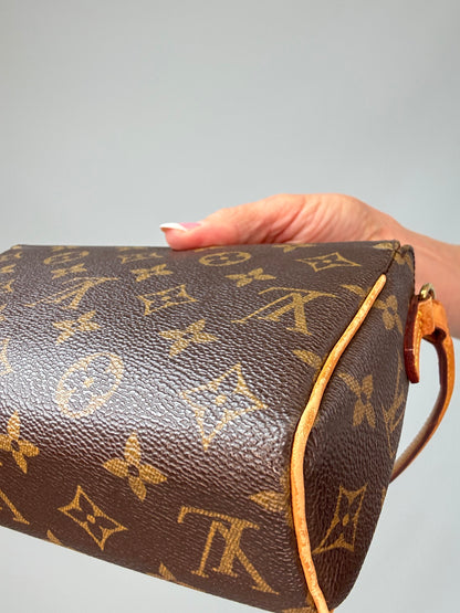 Louis Vuitton Monogram Recital Bag back right bottom corner
