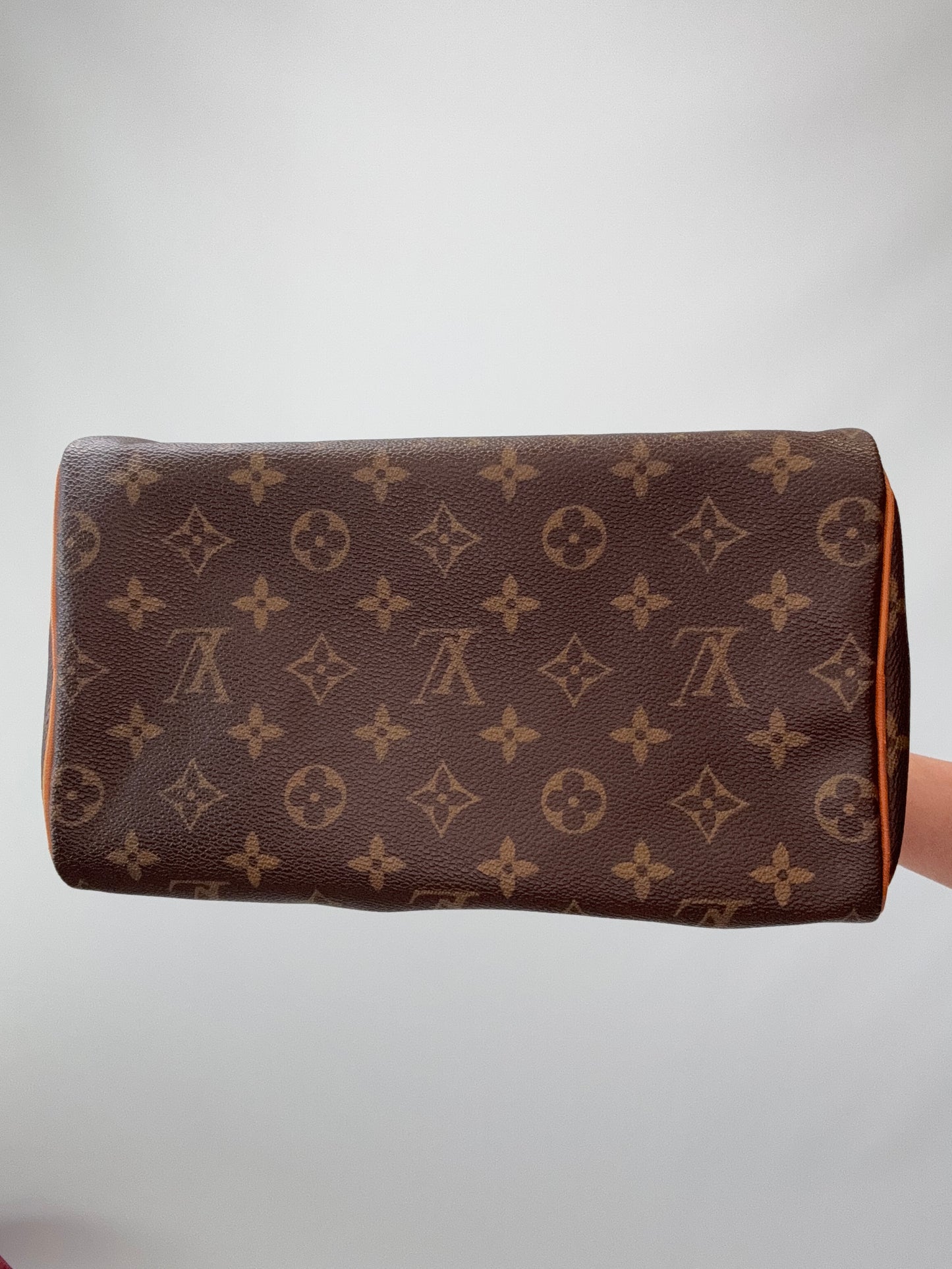 Louis Vuitton Monogram Speedy 25  bottom of handbag