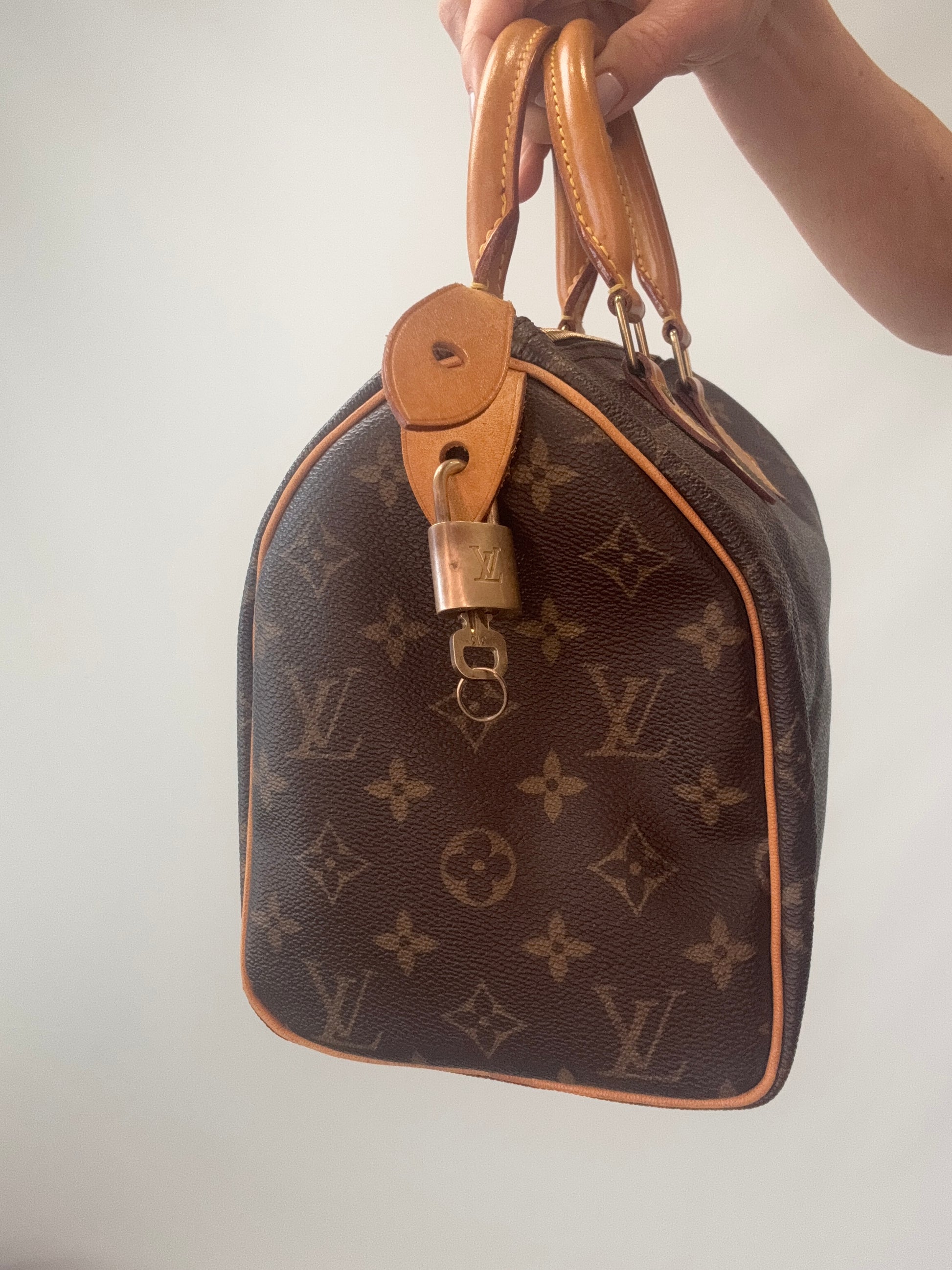 Louis Vuitton Monogram Speedy 25  right side of handbag