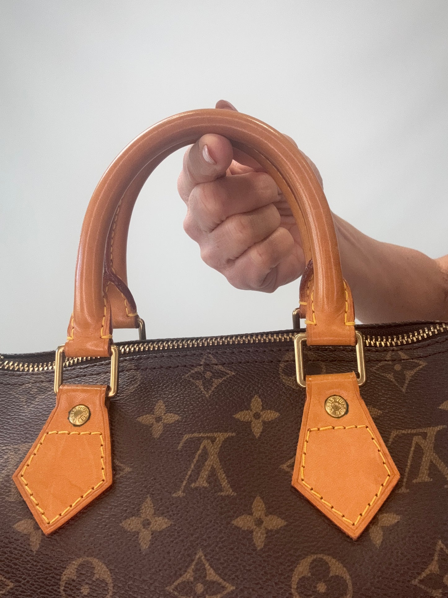 Louis Vuitton Monogram Speedy 25  back  of top handles