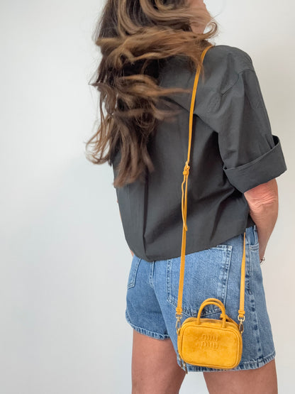 Miu Miu Beau Micro Suede Bag - Whiskey modeled 2