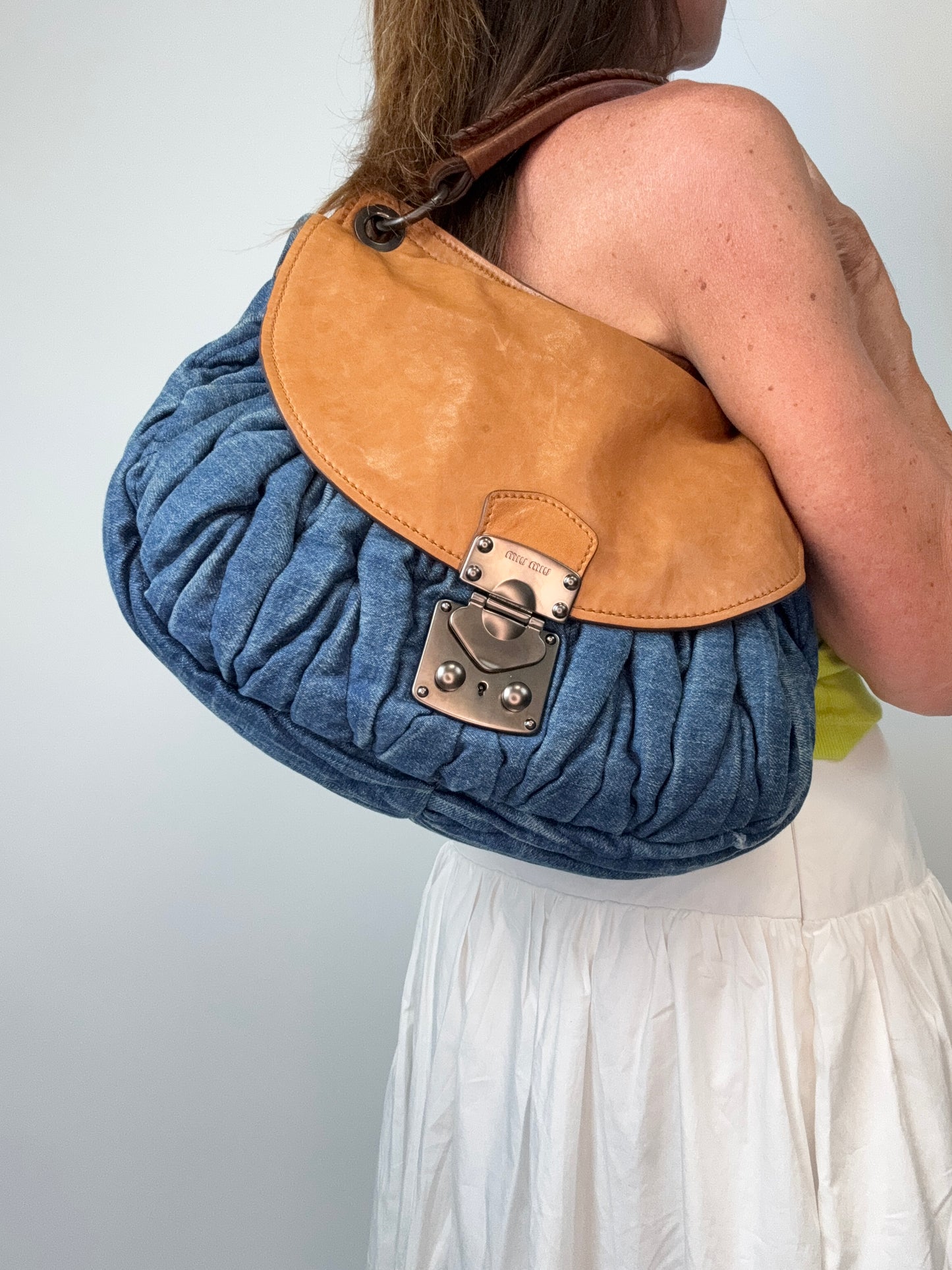 Miu Miu Blue & Brown Matelasse Denim and Leather Hobo modeled 2