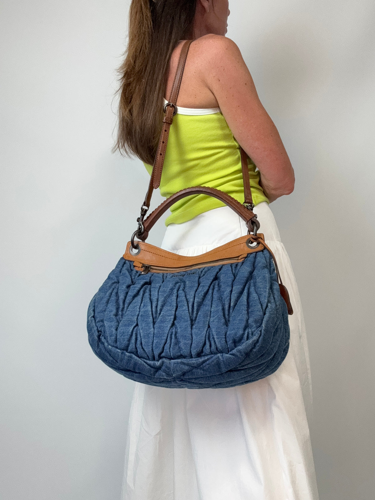Miu Miu Blue & Brown Matelasse Denim and Leather Hobo modeled 3