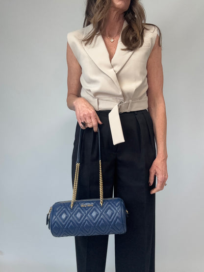 Miu Miu Diamond Quilted Cylinder Bag in Blue modeled 3