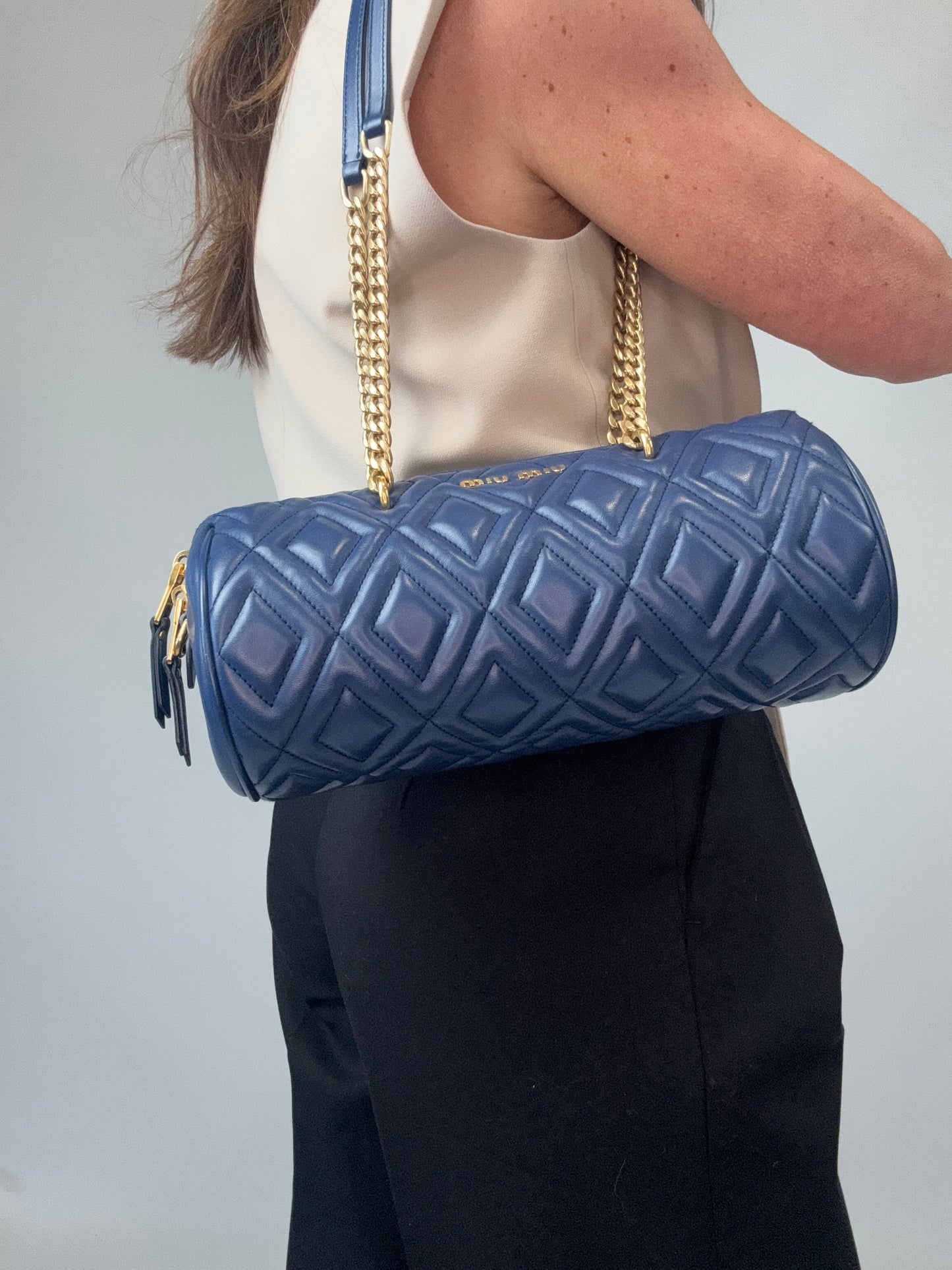 Miu Miu Diamond Quilted Cylinder Bag in Blue modeled